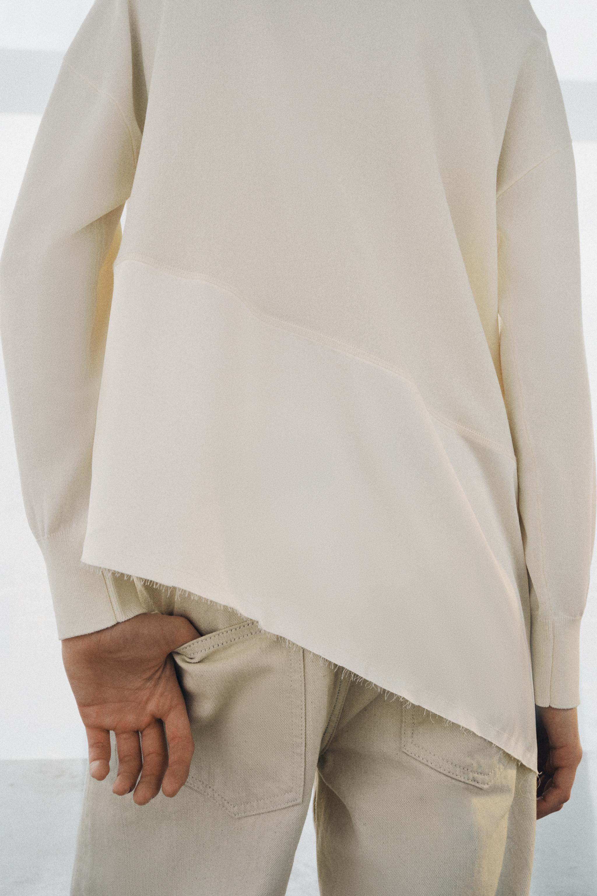 PULL EN MAILLE BIMATIÈRE ASYMÉTRIQUE