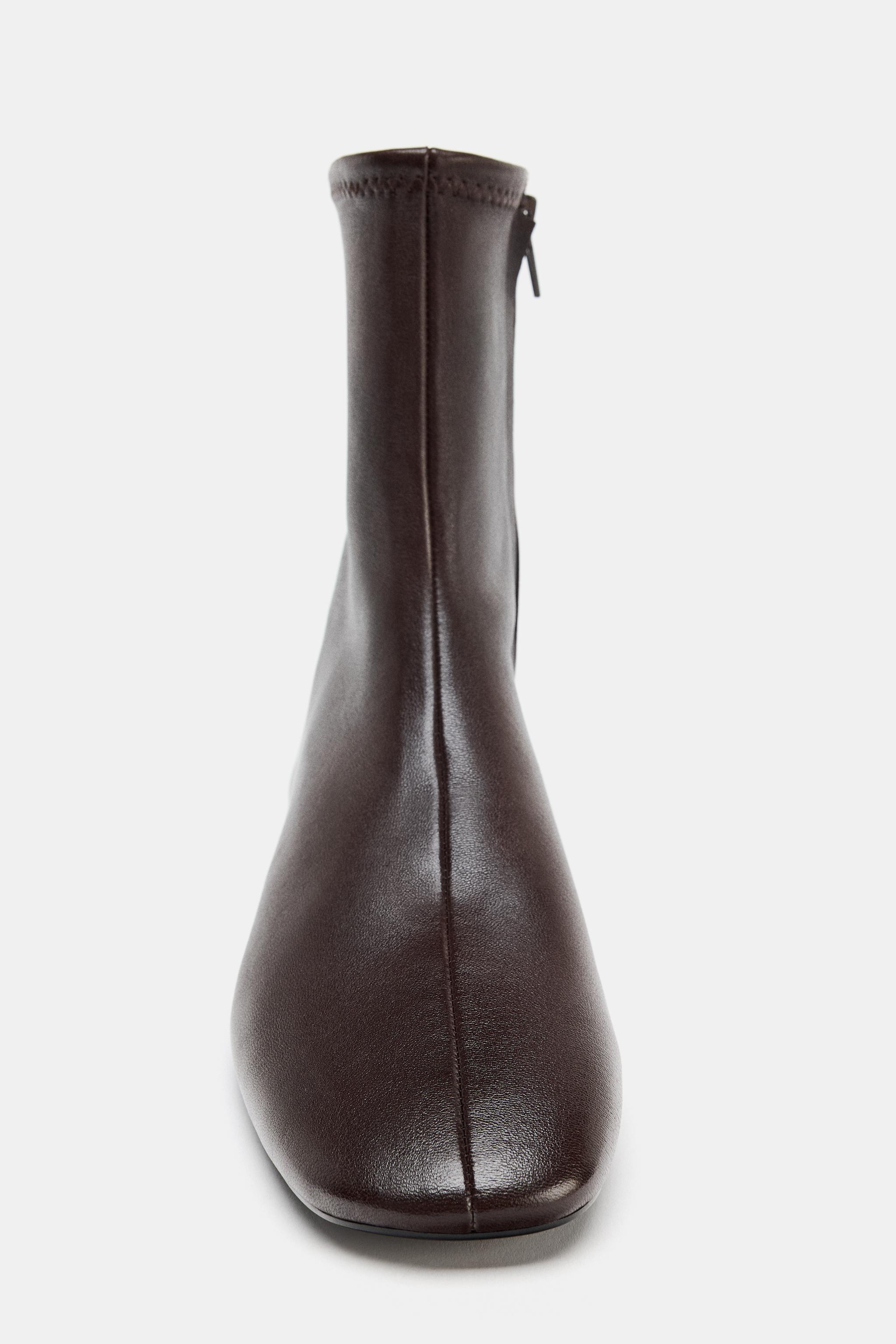 BOTTINES PLATES EN CUIR LIMITED EDITION