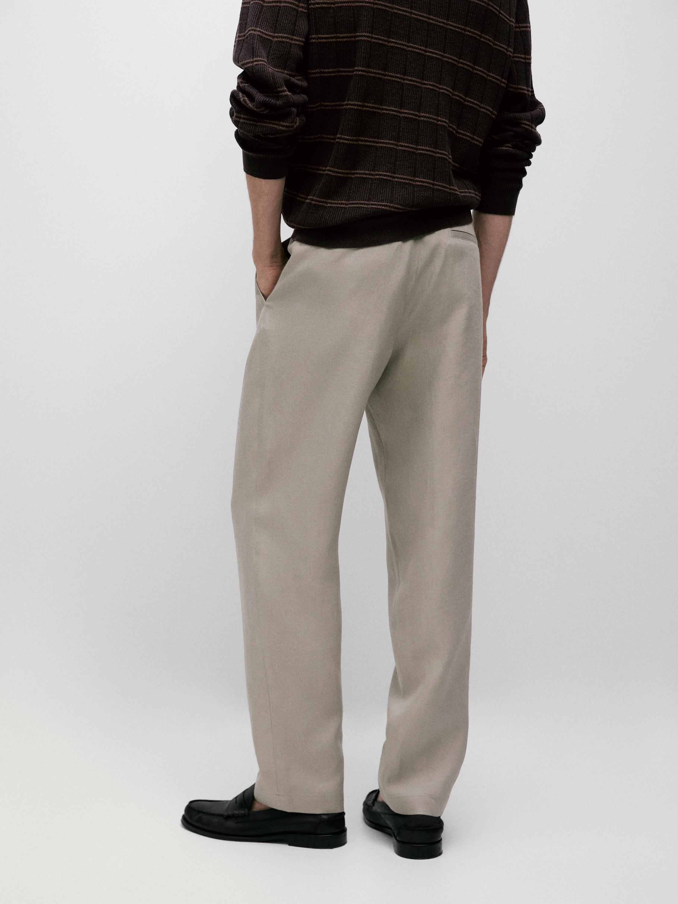 100% linen tapered fit trousers