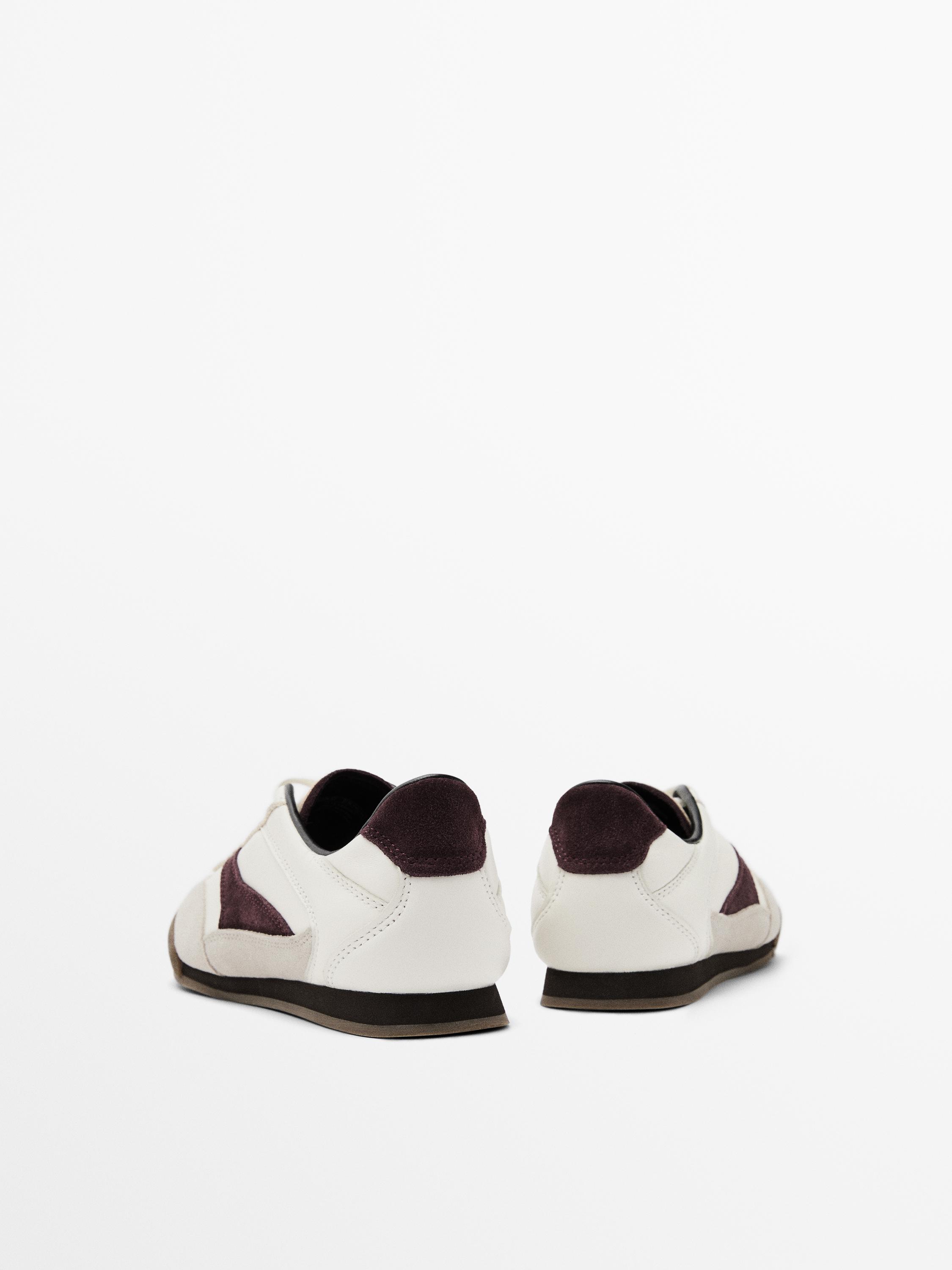 Tennis cuir contrastant