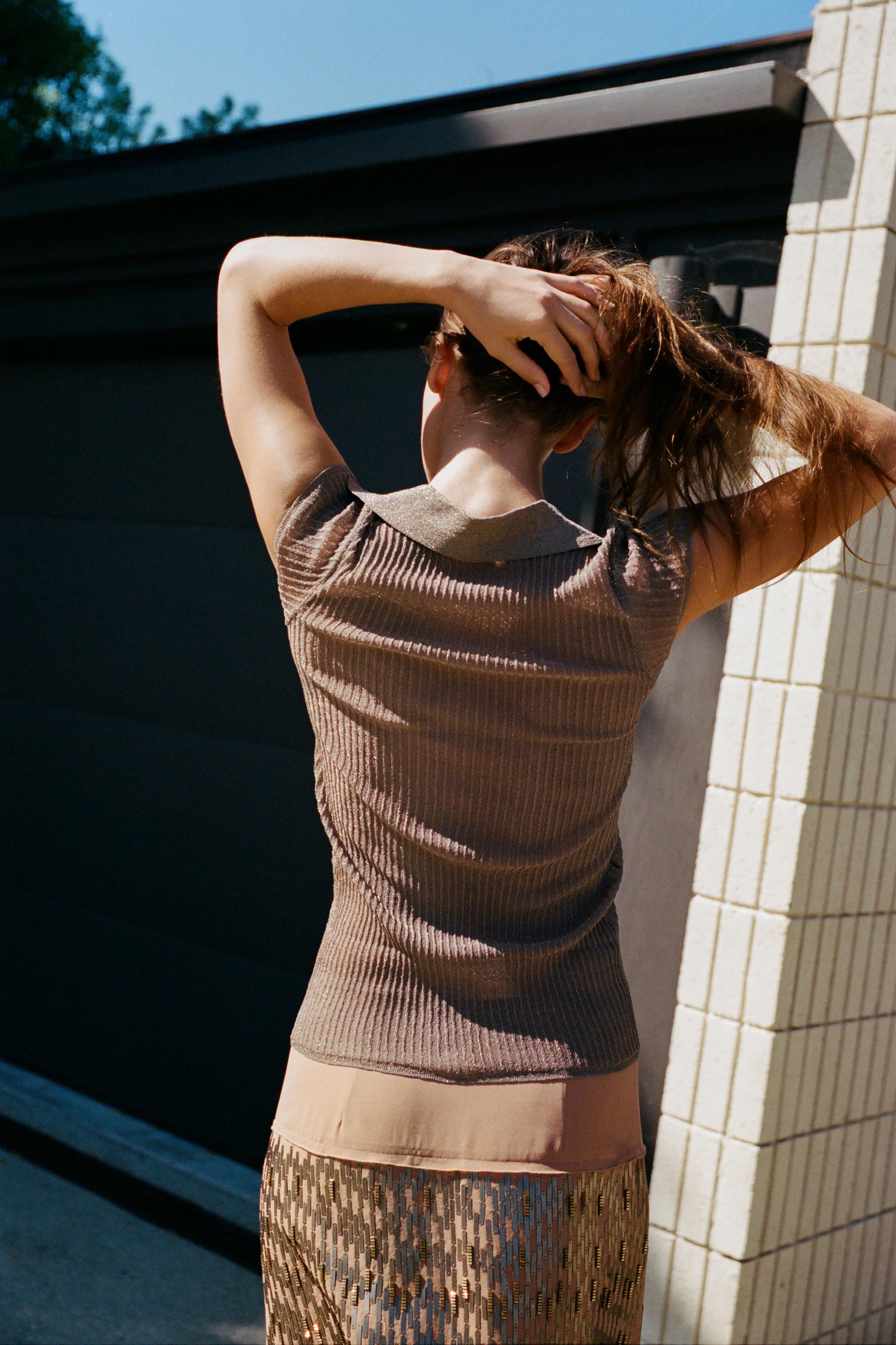 METALLIC YARN KNIT TOP WITH LACE