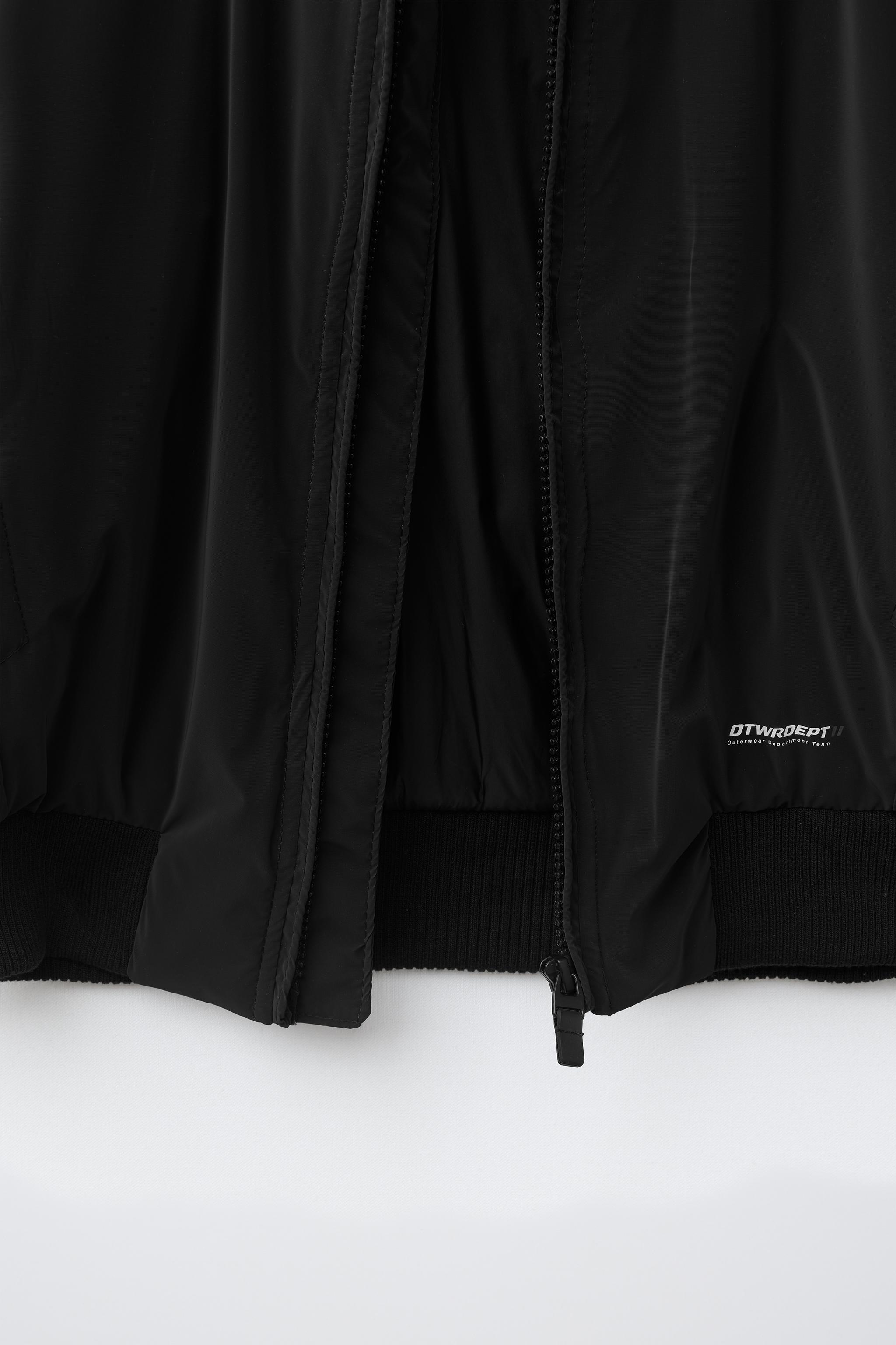 RUBBERIZED BOMBER JACKET WITH DETACHABLE HOOD