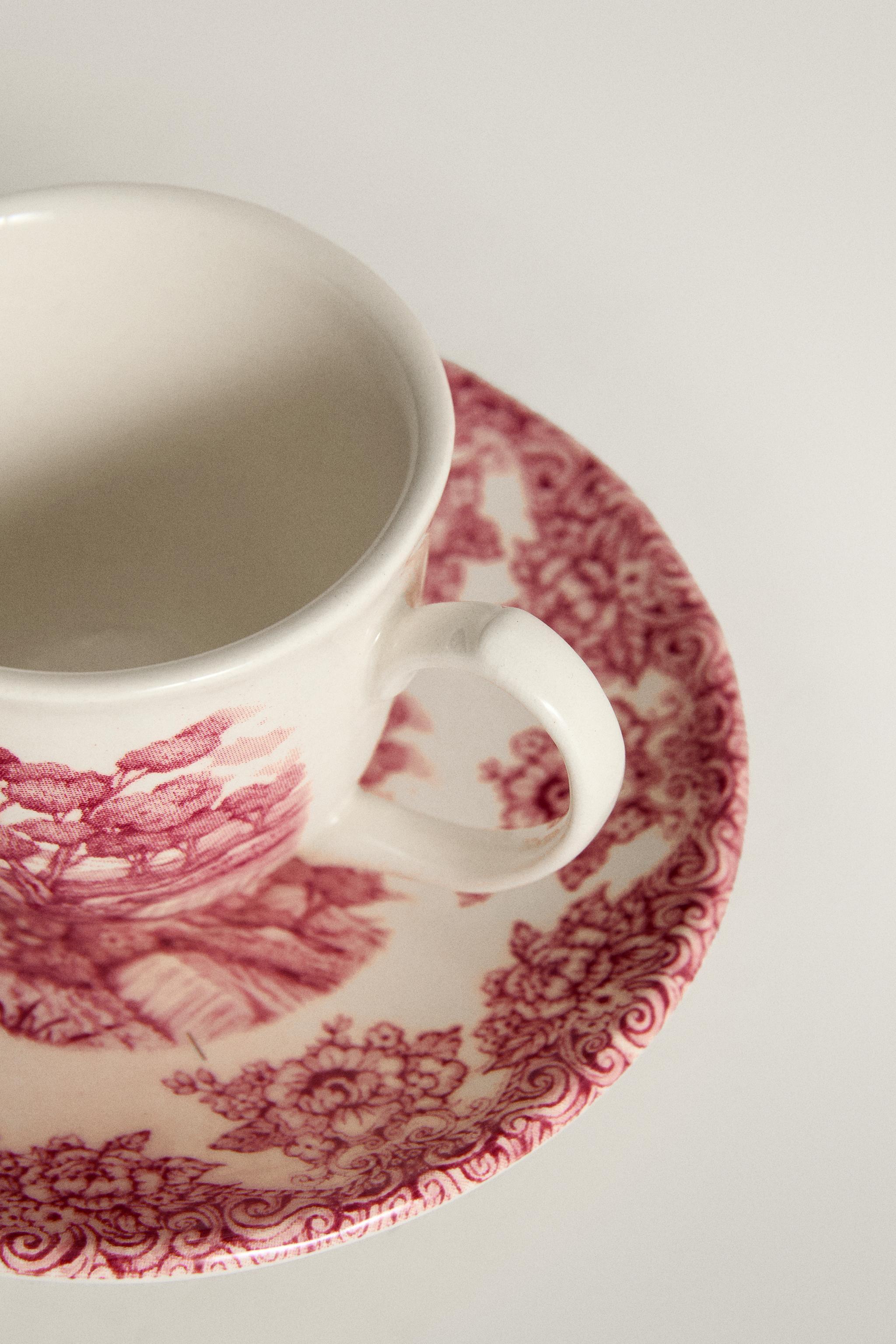 FLORAL AND LANDSCAPE EARTHENWARE COFFEE CUP AND SAUCER SET