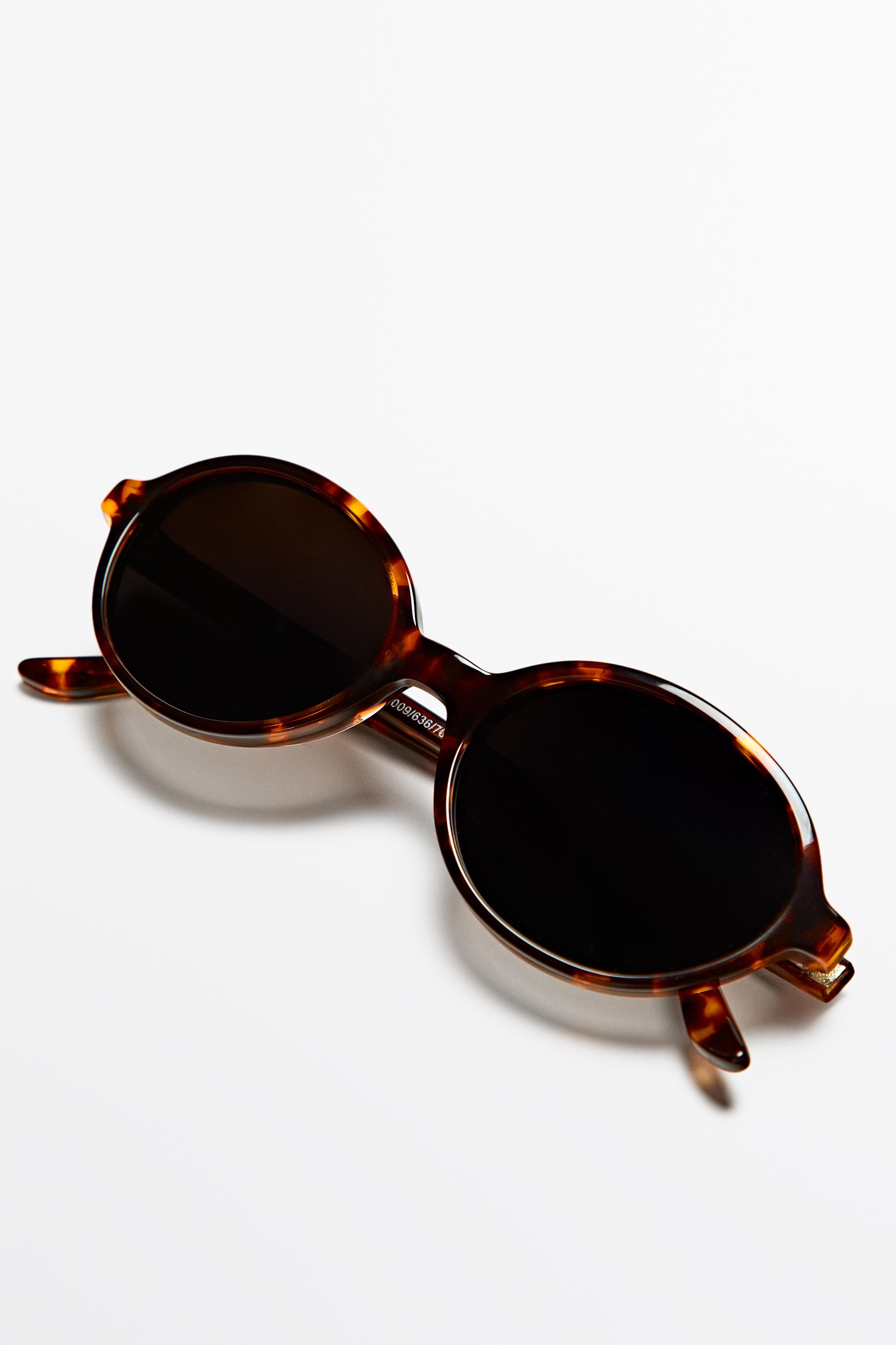 Oval tortoiseshell-effect sunglasses