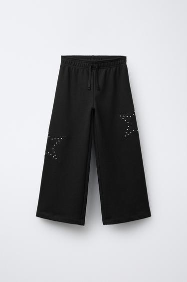 WIDE-LEG TROUSERS WITH STAR STUDS - Black by Zara