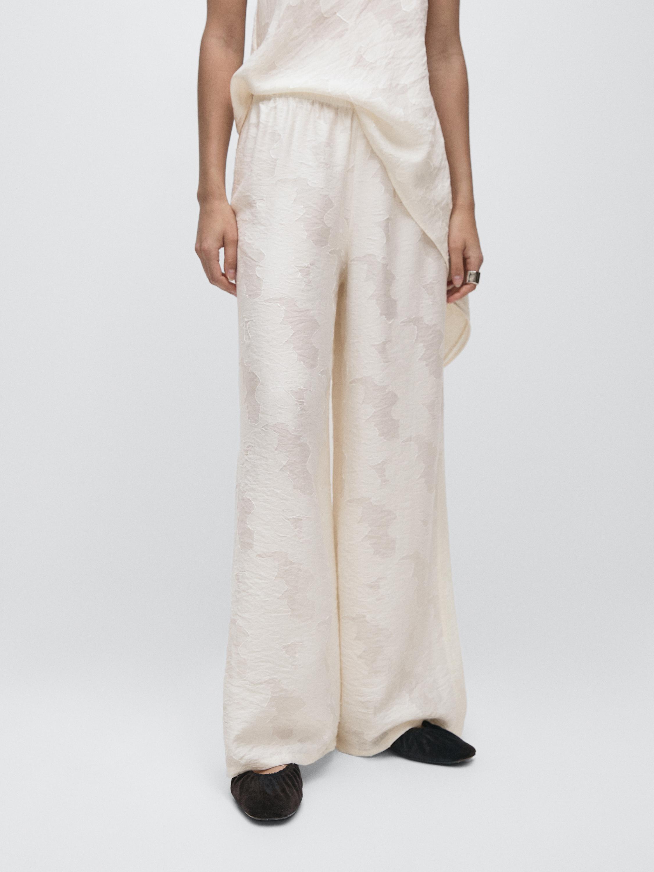 Flowing stretch trousers with fabric detail — White