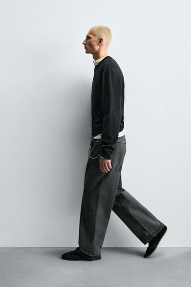 جينز بقَصّة واسعة بمظهر شمعي - فحمي by Zara