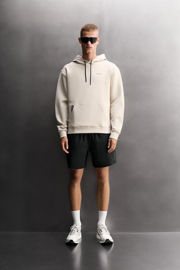 Sudadera tecnica capucha