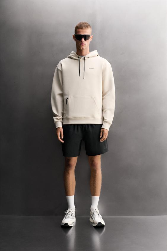 TEKNİK KAPÜŞONLU SWEATSHIRT