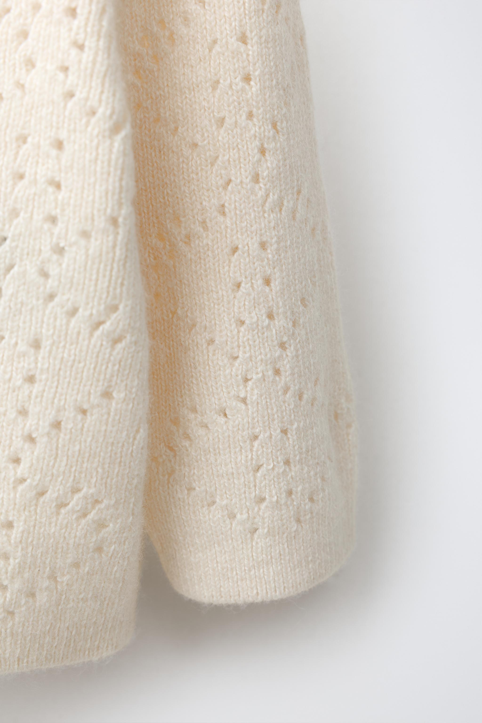 GILET EN MAILLE AJOURÉ AVEC LAINE