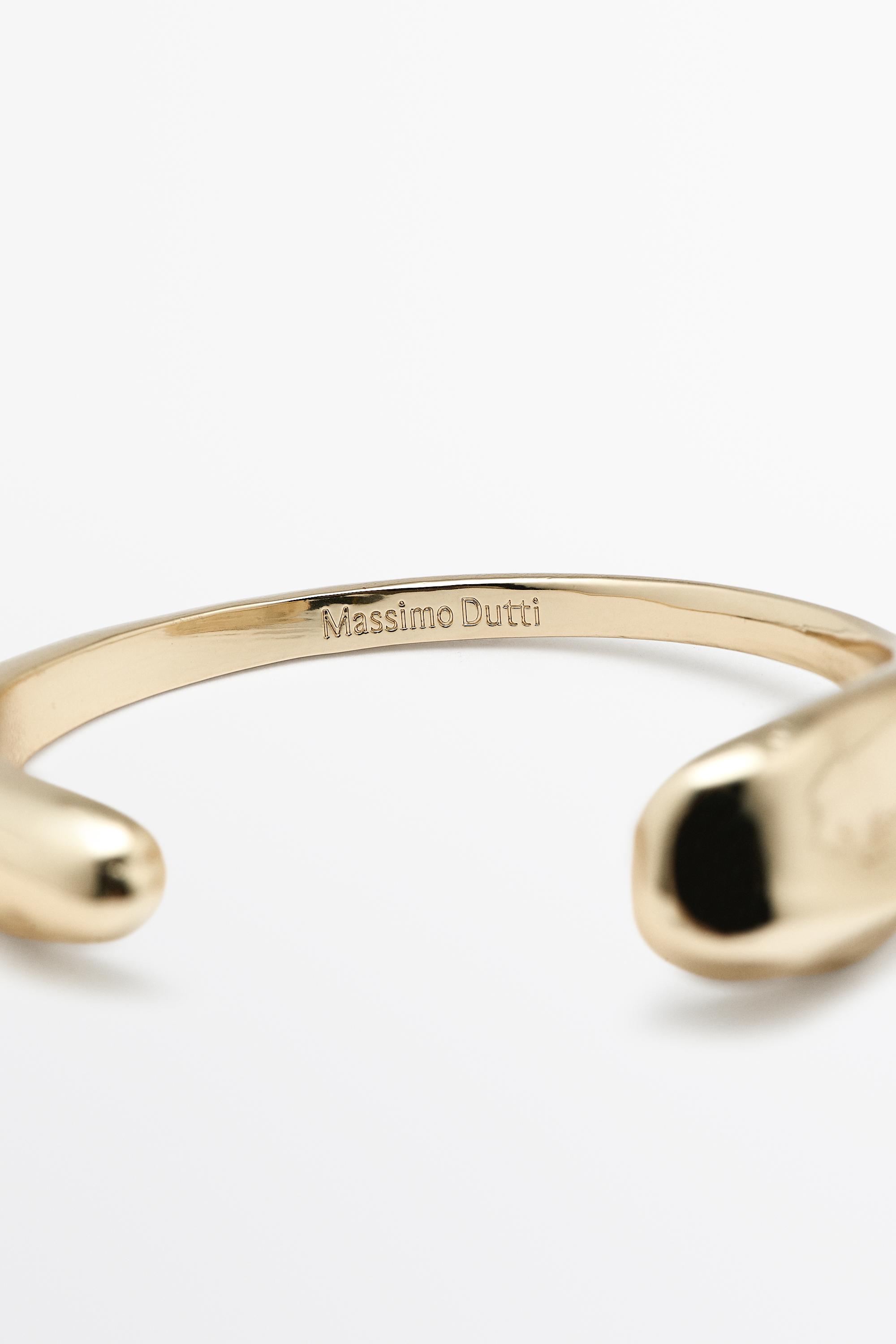 Curved open-design bracelet
