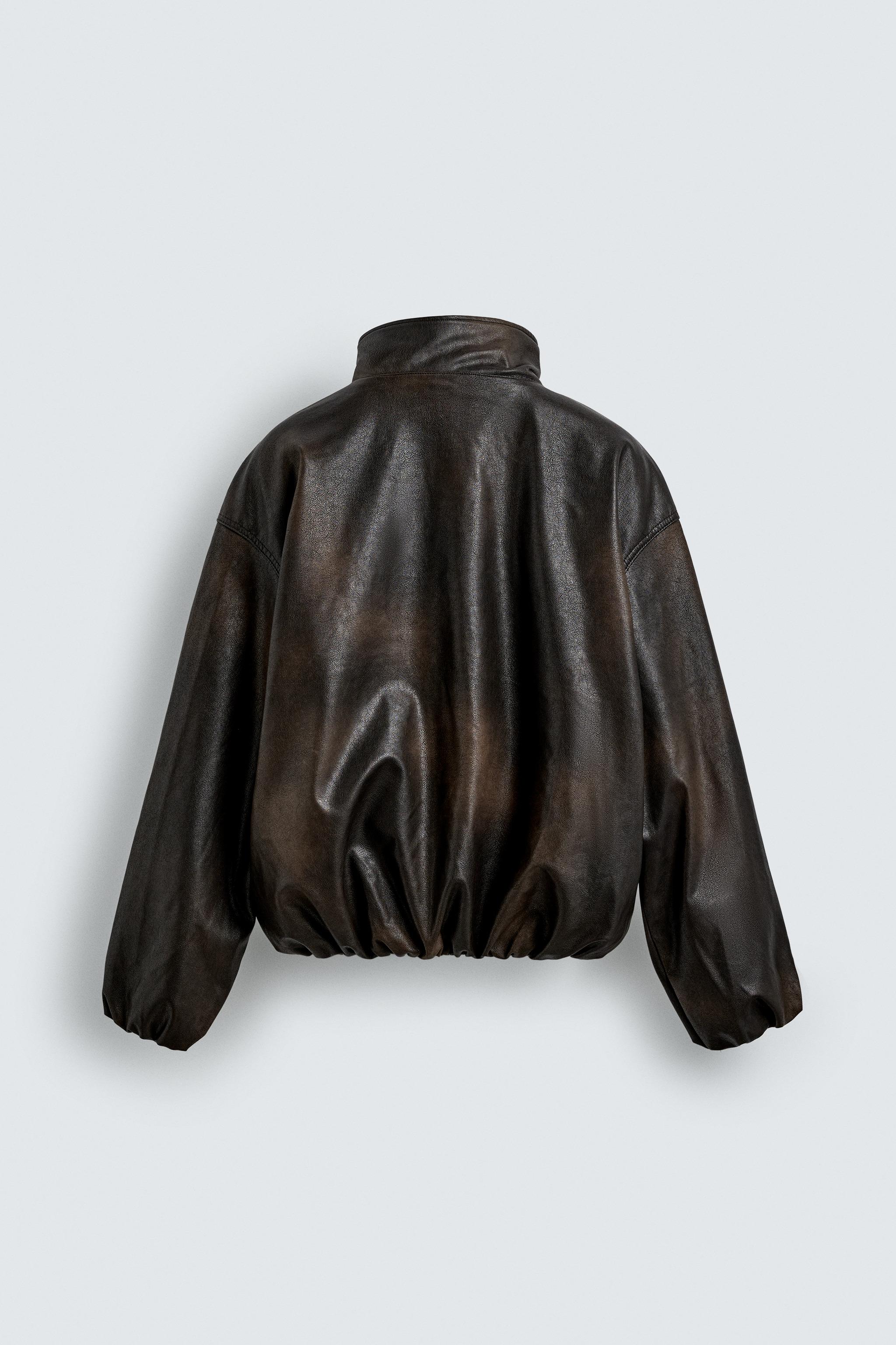 BLOUSON EN MATIÈRE SYNTHÉTIQUE EFFET DÉLAVÉ