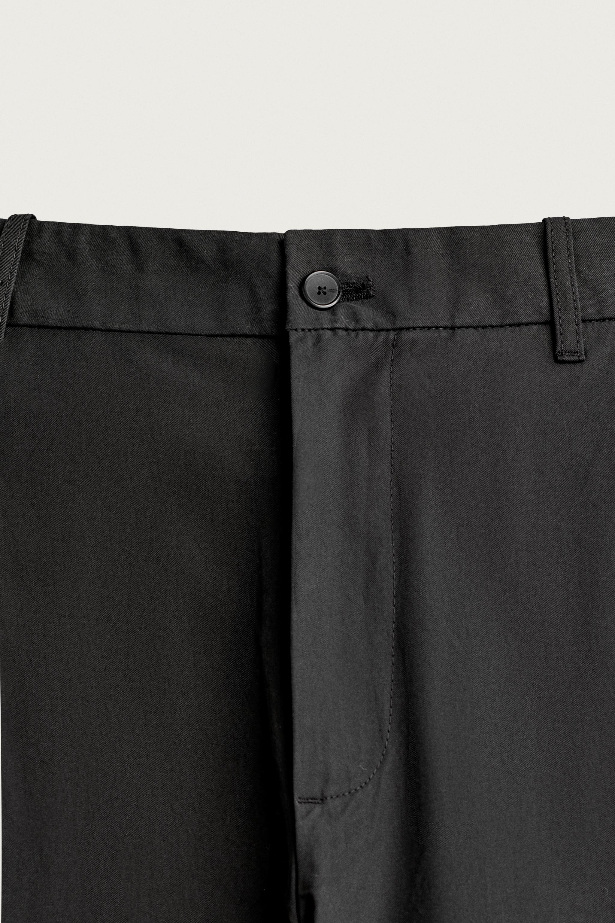 STRAIGHT-FIT PANTS WITH SIDE PLEATS
