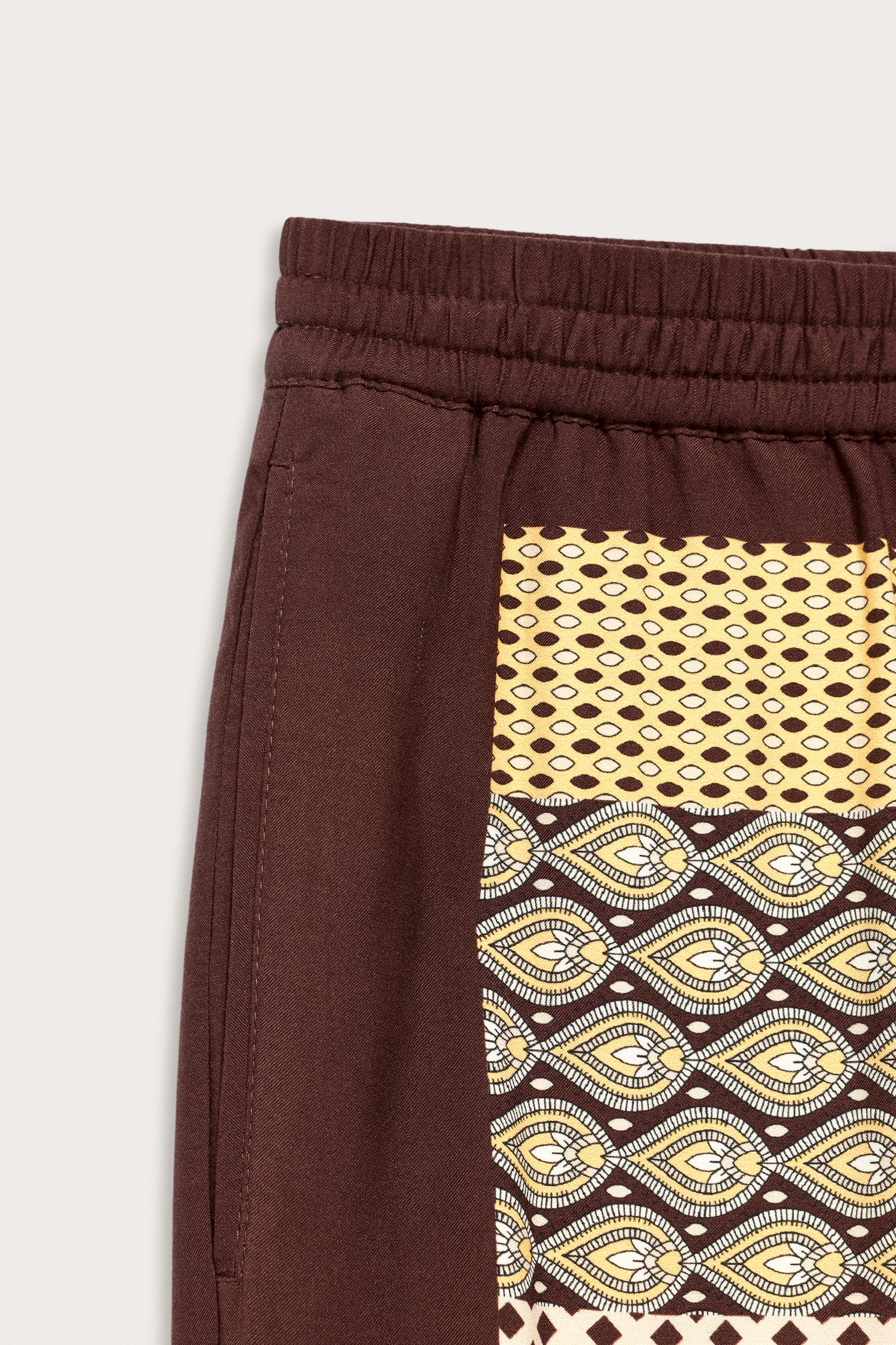 LIMITED EDITION MIXED PRINT FLOWY PANTS