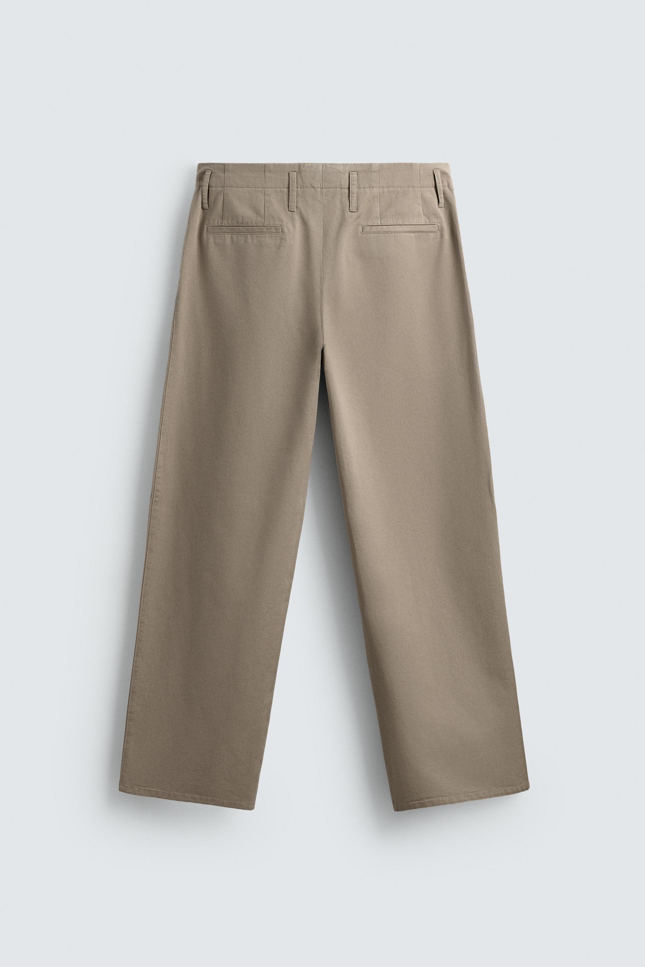 PANTALON CHINO À PLIS