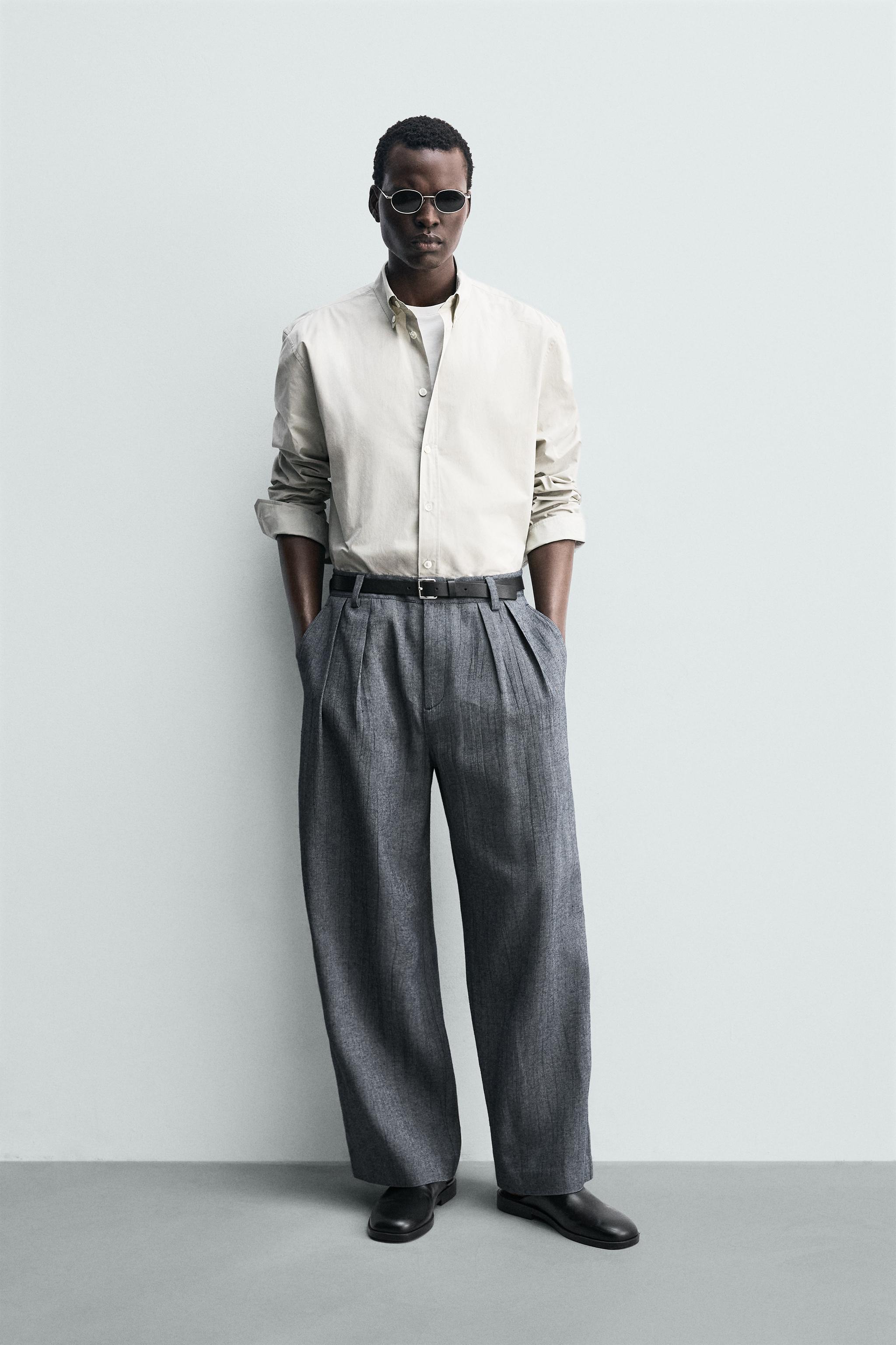PLEATED RELAXED FIT PANTS