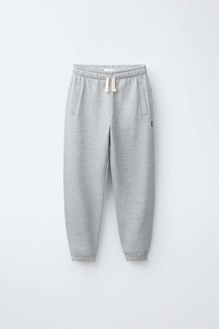 SOLID FLEECE JOGGERS WITH LABEL — Gray marl