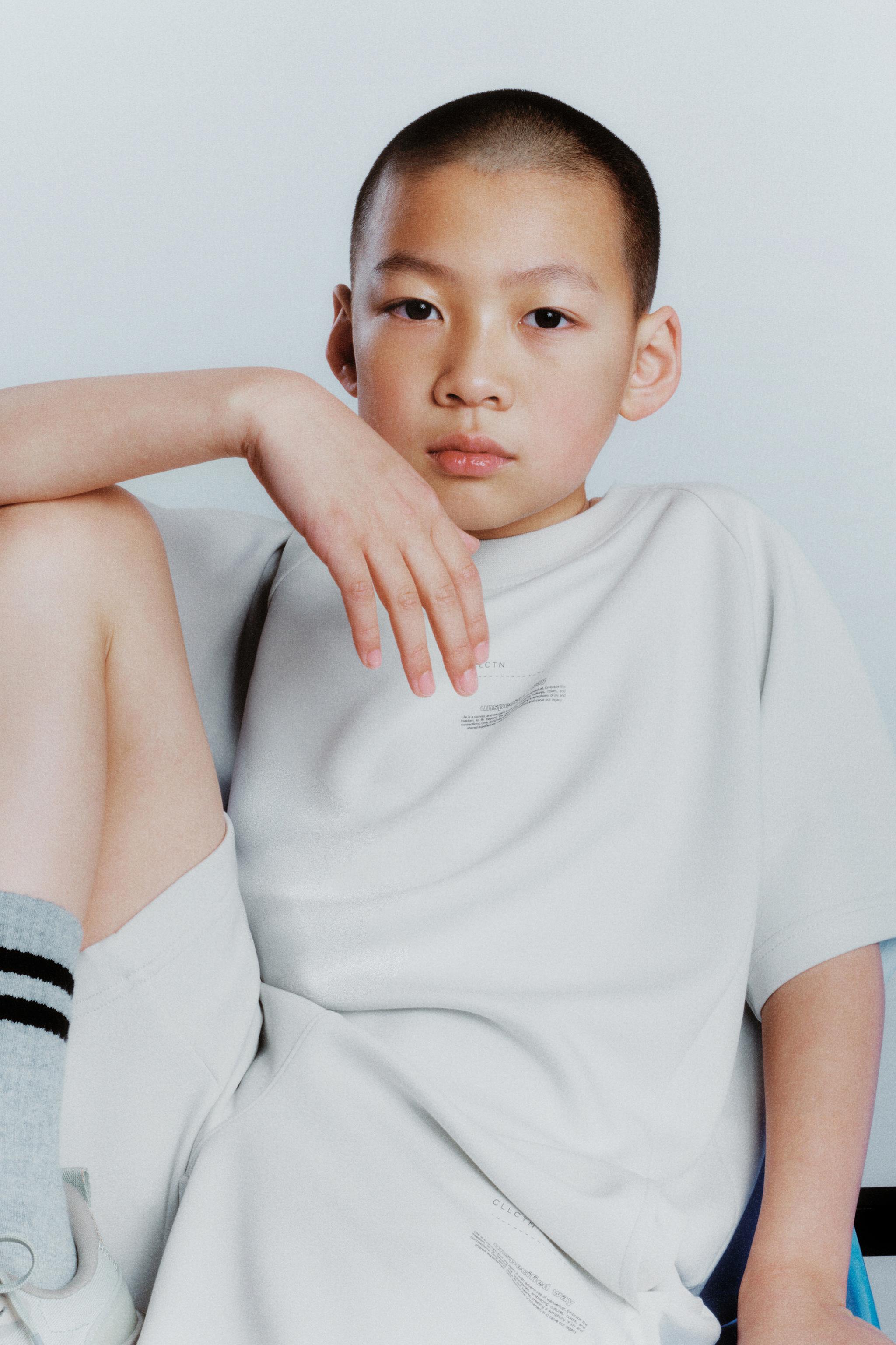 SPORTY SHORT SLEEVE SWEATSHIRT