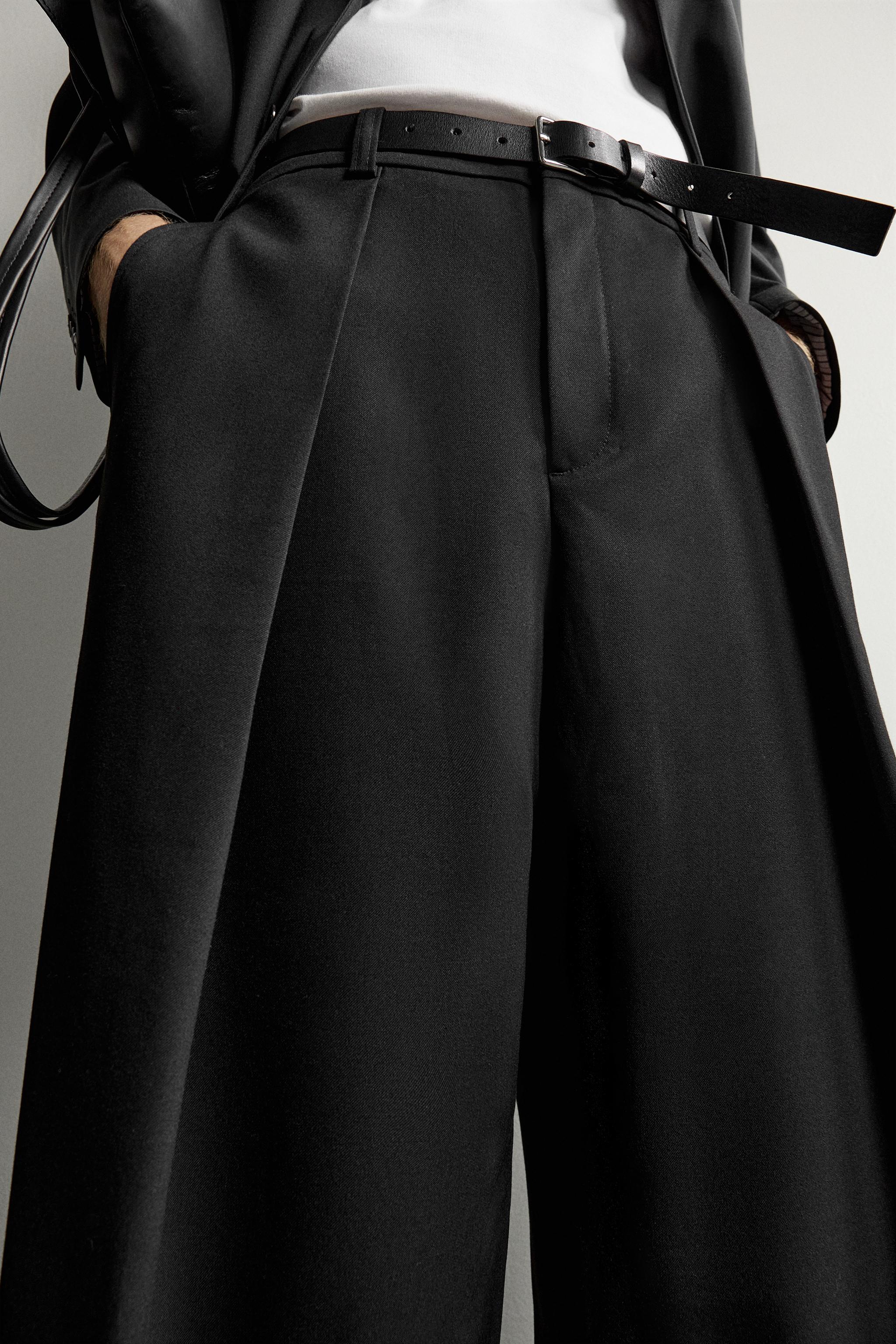PLEATED RELAXED-FIT PANTS