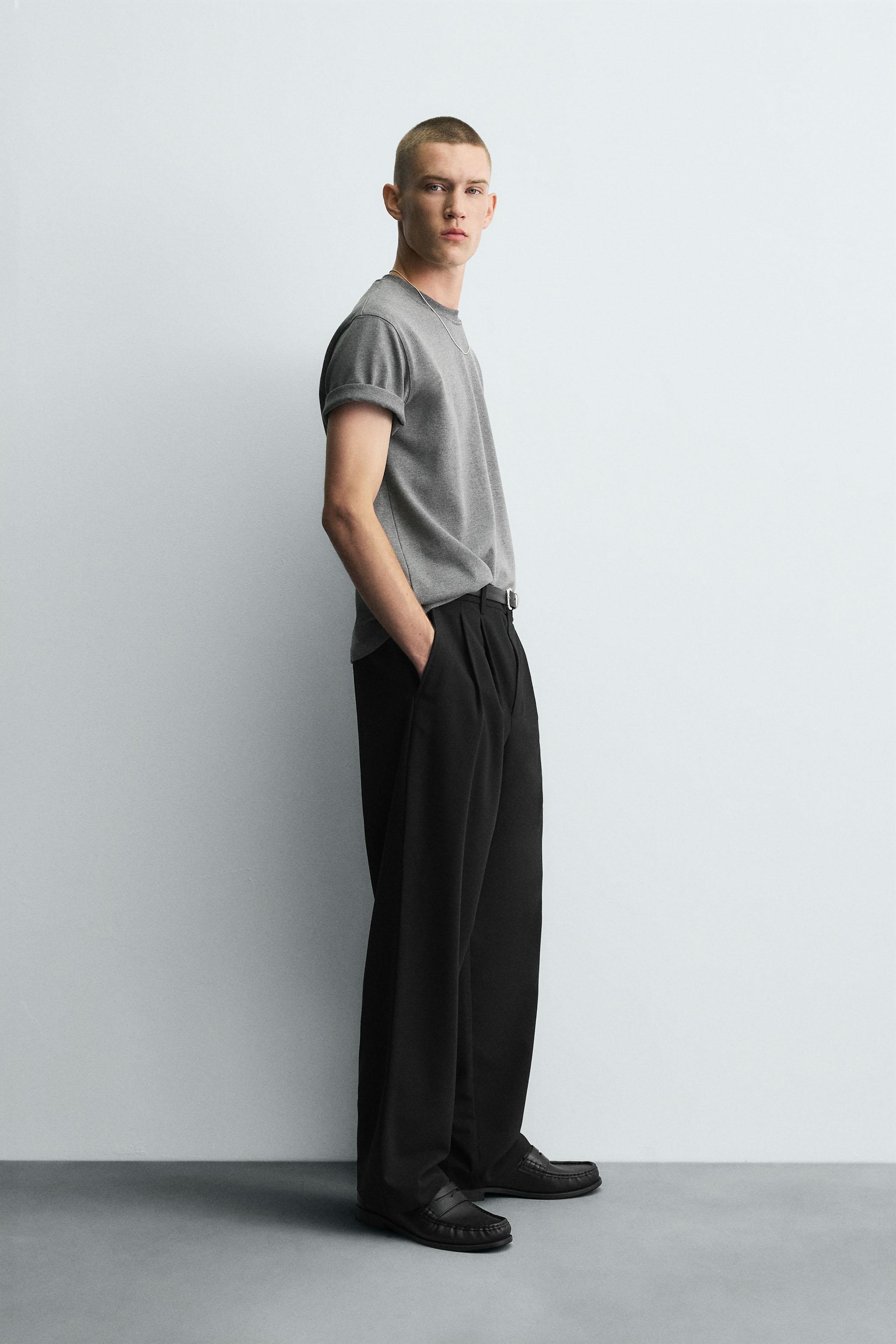 WIDE-LEG PLEATED TROUSERS