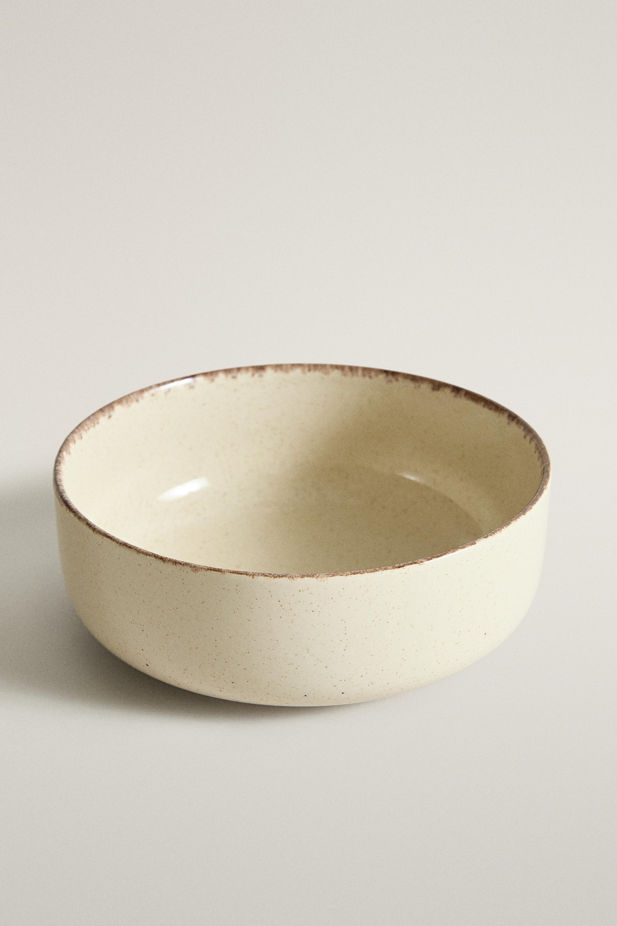 STONEWARE BOWL WITH AGED RIM