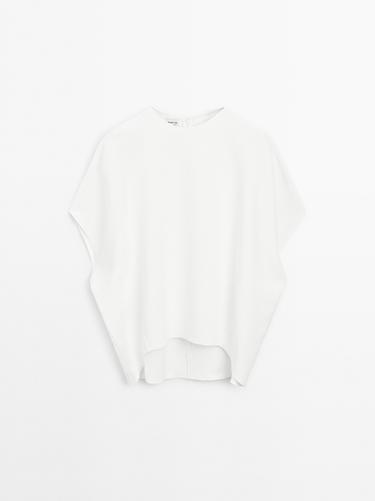 Blusón largo sin mangas - STUDIO - Blanco de Zara