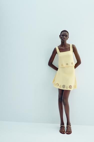 FALDA MINI PUNTO BORDADOS PERFORADOS - Amarillo de Zara