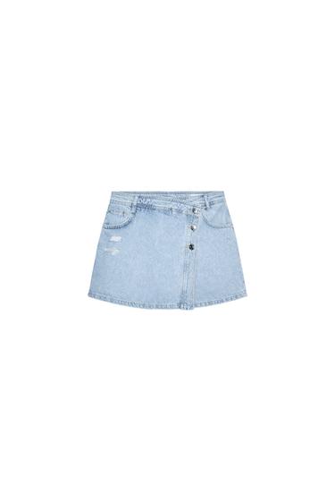 Front view of a blue denim mini skirt with buttons and front pockets.