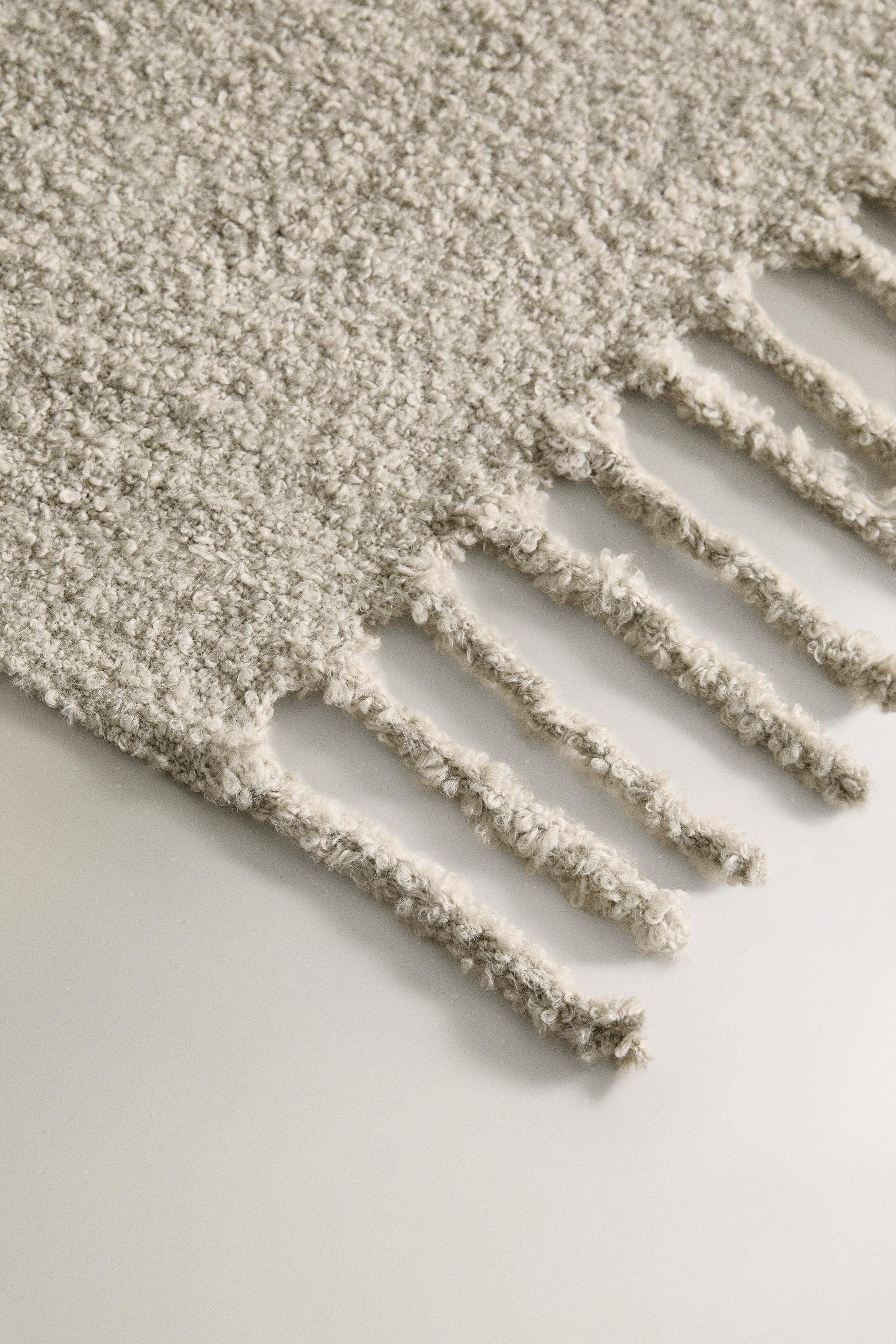 COUVERTURE À FRANGES