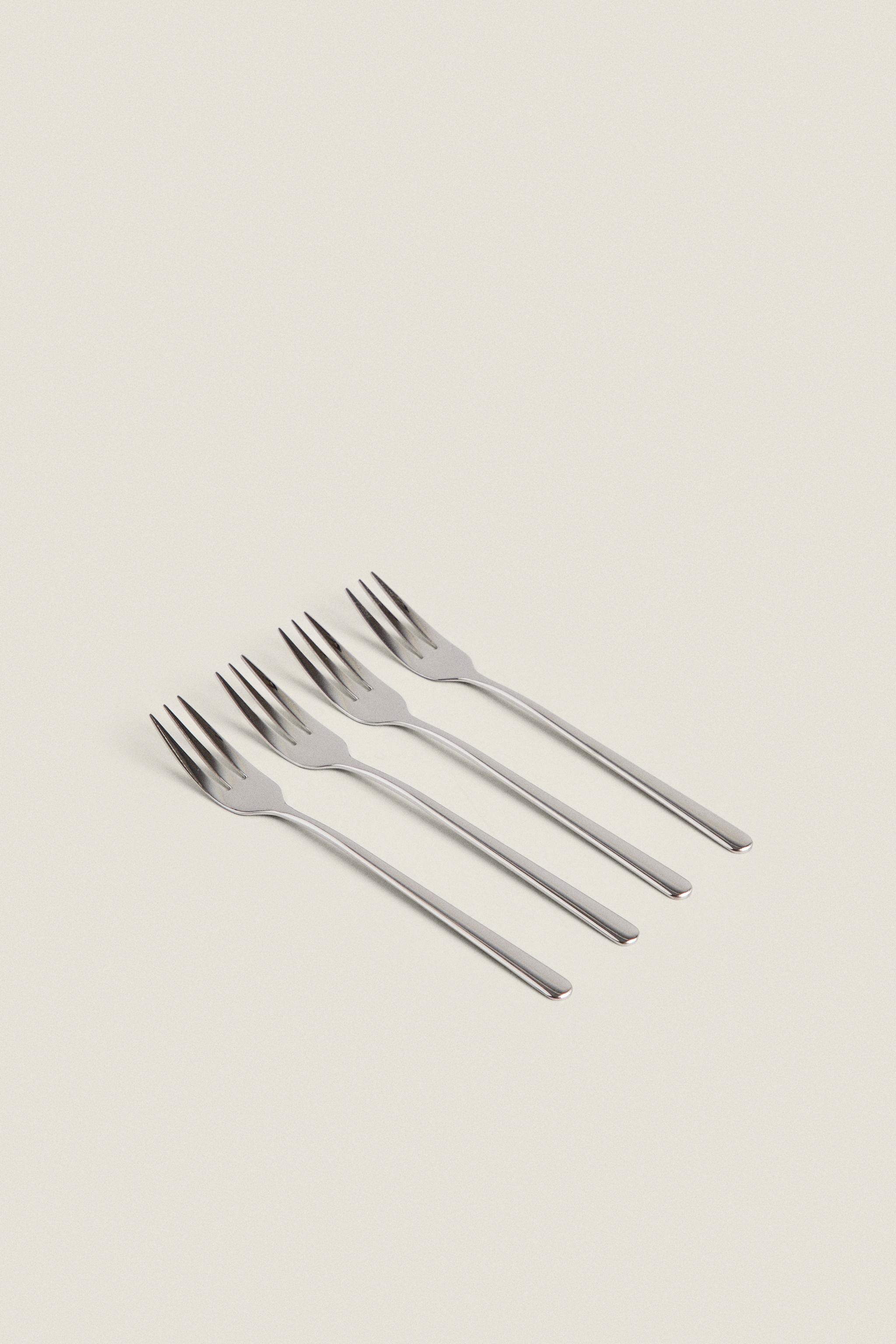 PACK OF SHINY STEEL DESSERT FORKS (PACK OF 4) — Multicolored