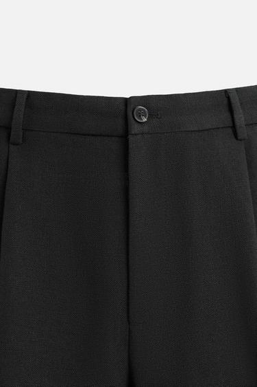 RELAXED FIT PLEATED TROUSERS - Black by Zara