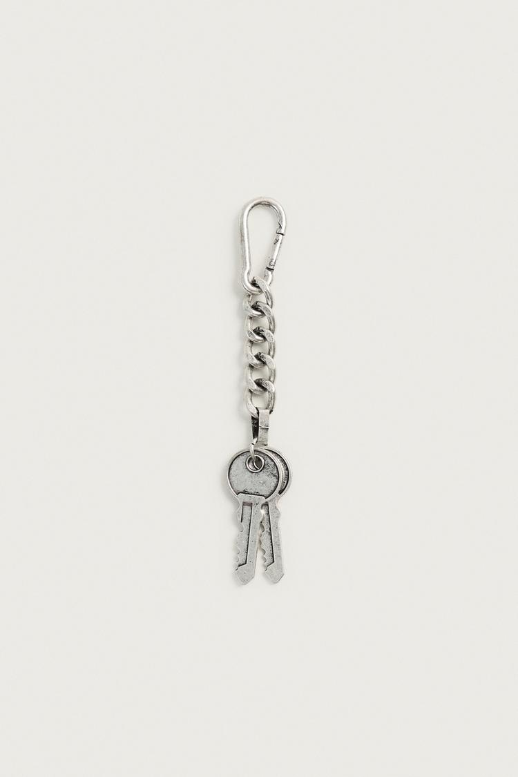 METAL KEY-SHAPED CHARM KEYCHAIN — Silver