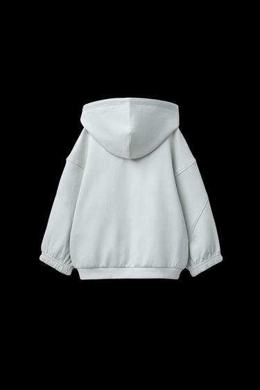SUDADERA INTERLOCK CREMALLERA CAPUCHA LOGO - Piedra de Zara
