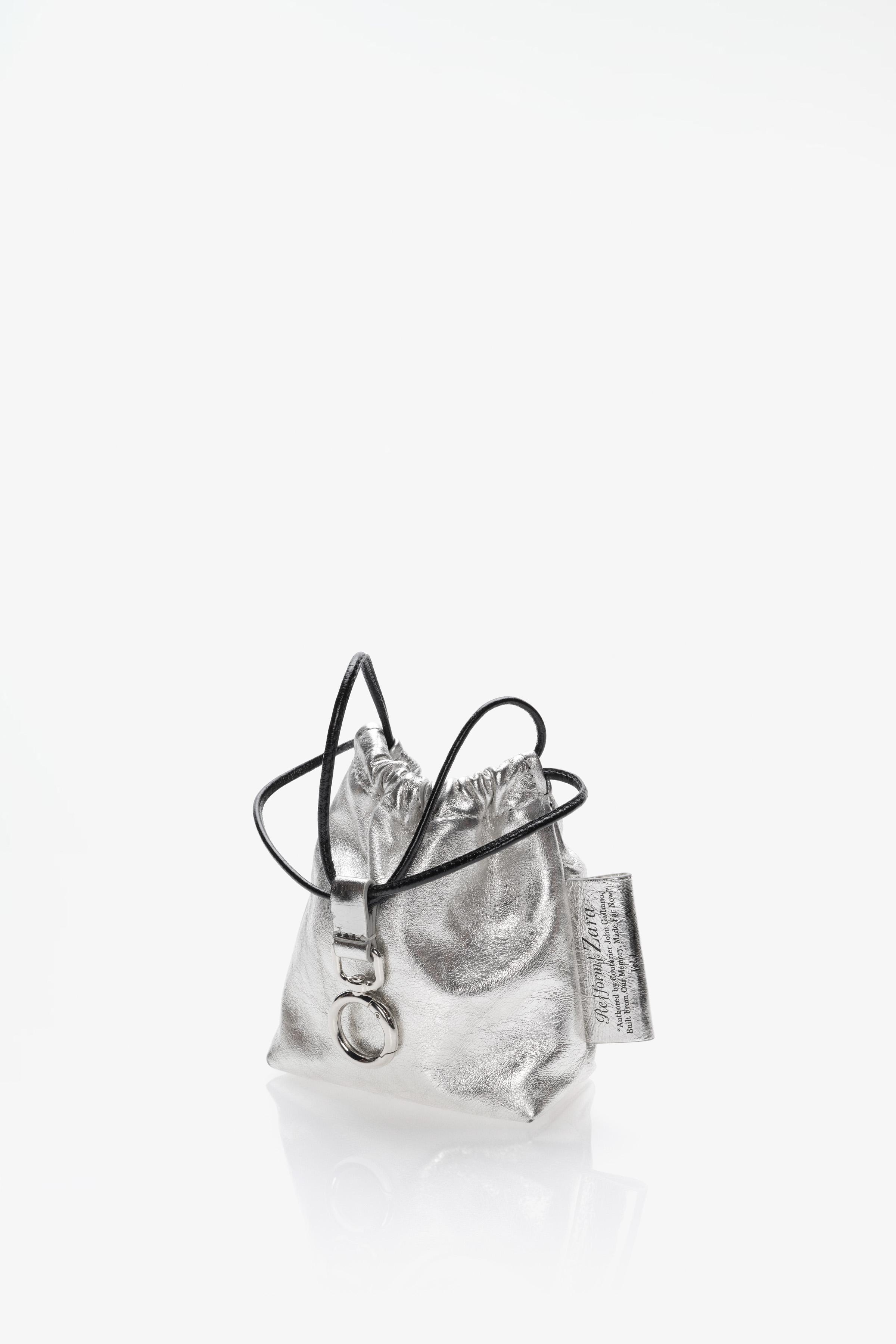 LIMITED EDITION TRI-CHIC LEATHER CHARM