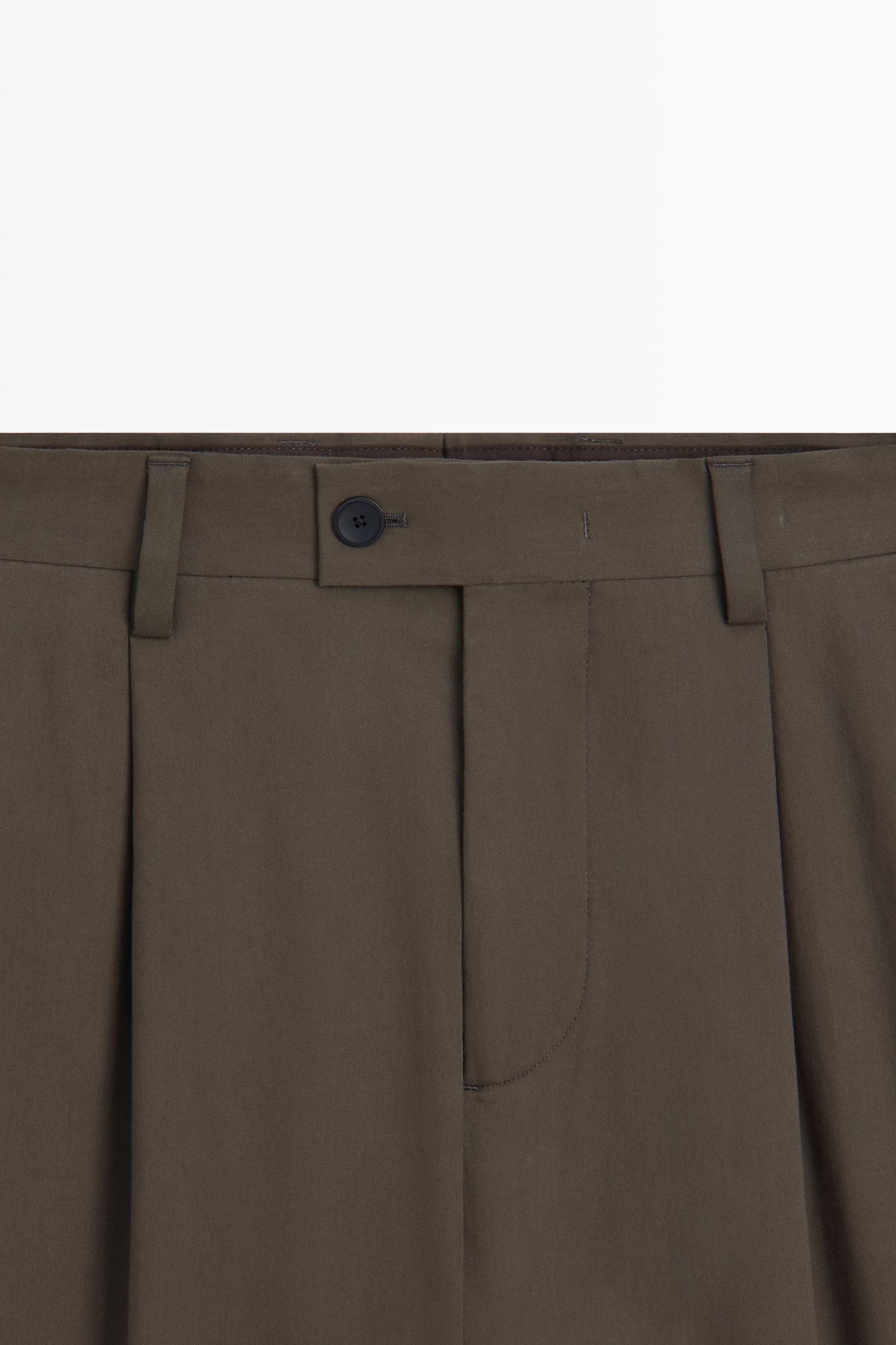 Pantalon jambe large à pinces en daim