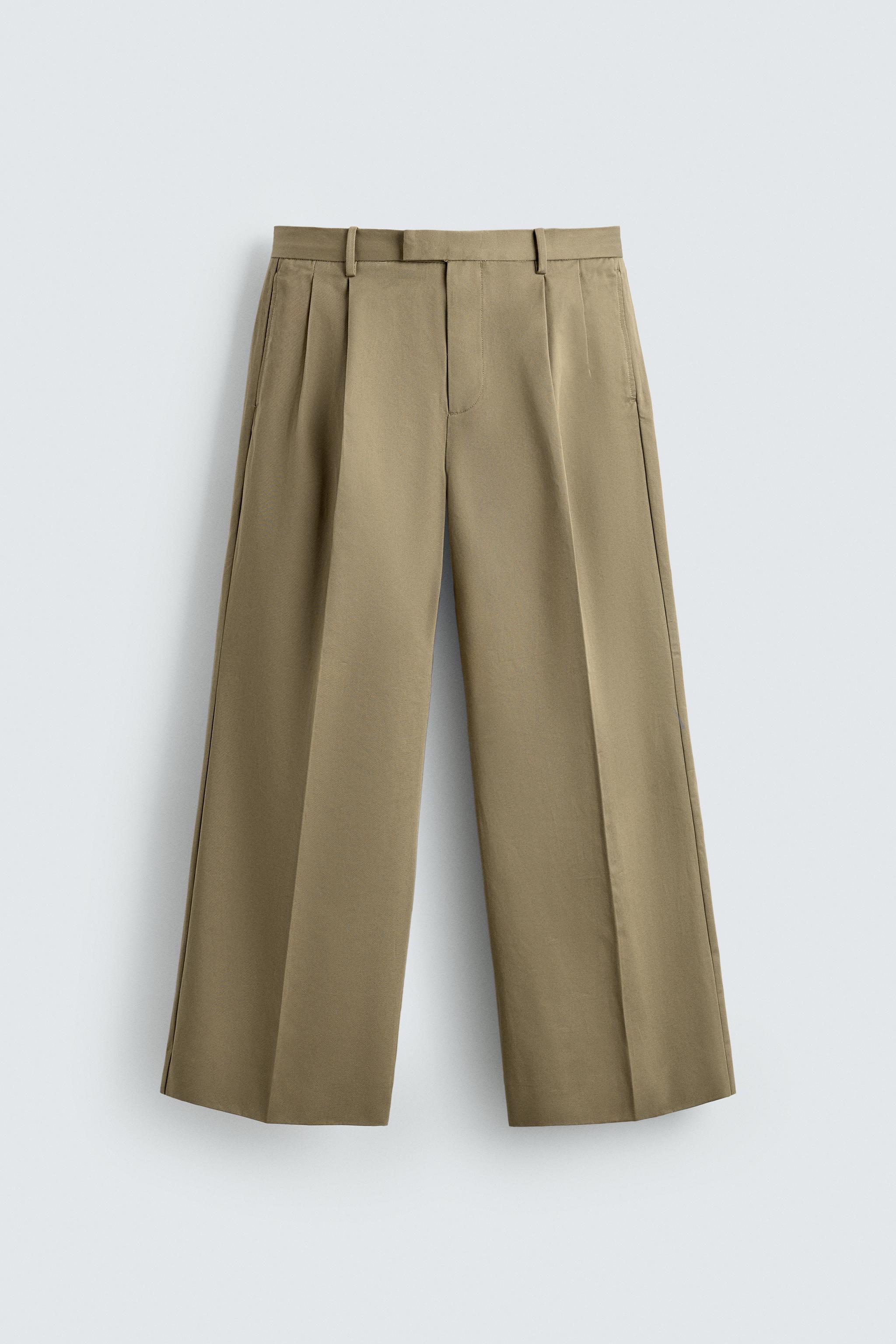 PLEATED WIDE FIT PANTS