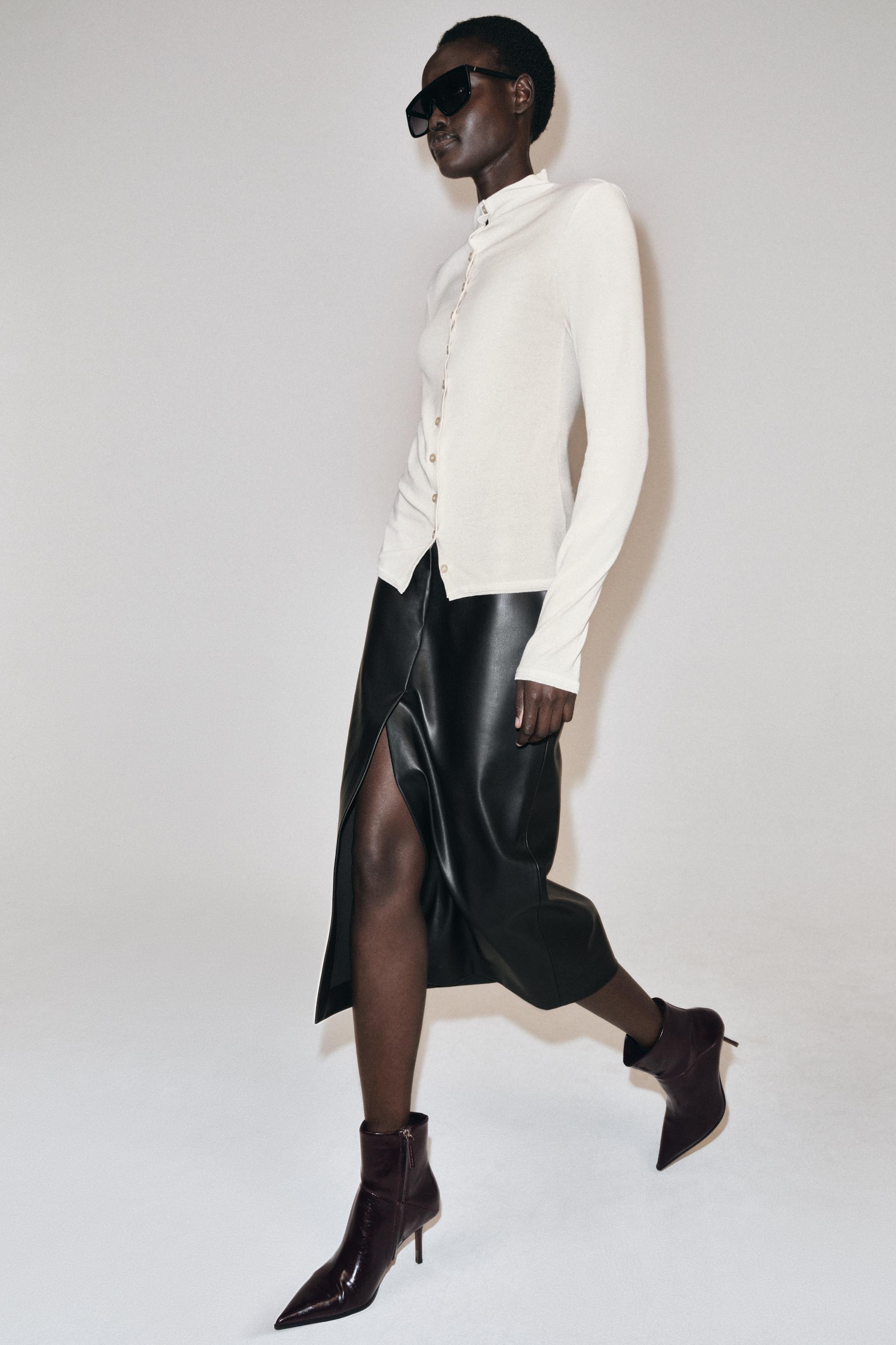 PATENT HEELED BOOTIES