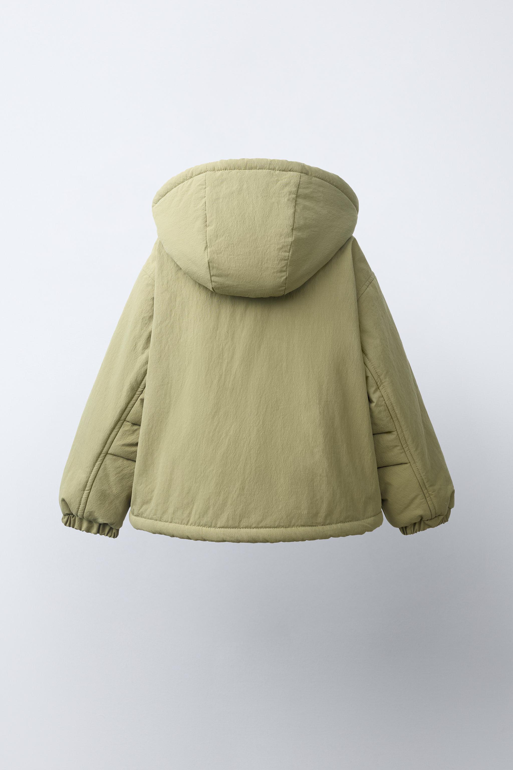 BLOUSON À CAPUCHE EFFET MOUTON