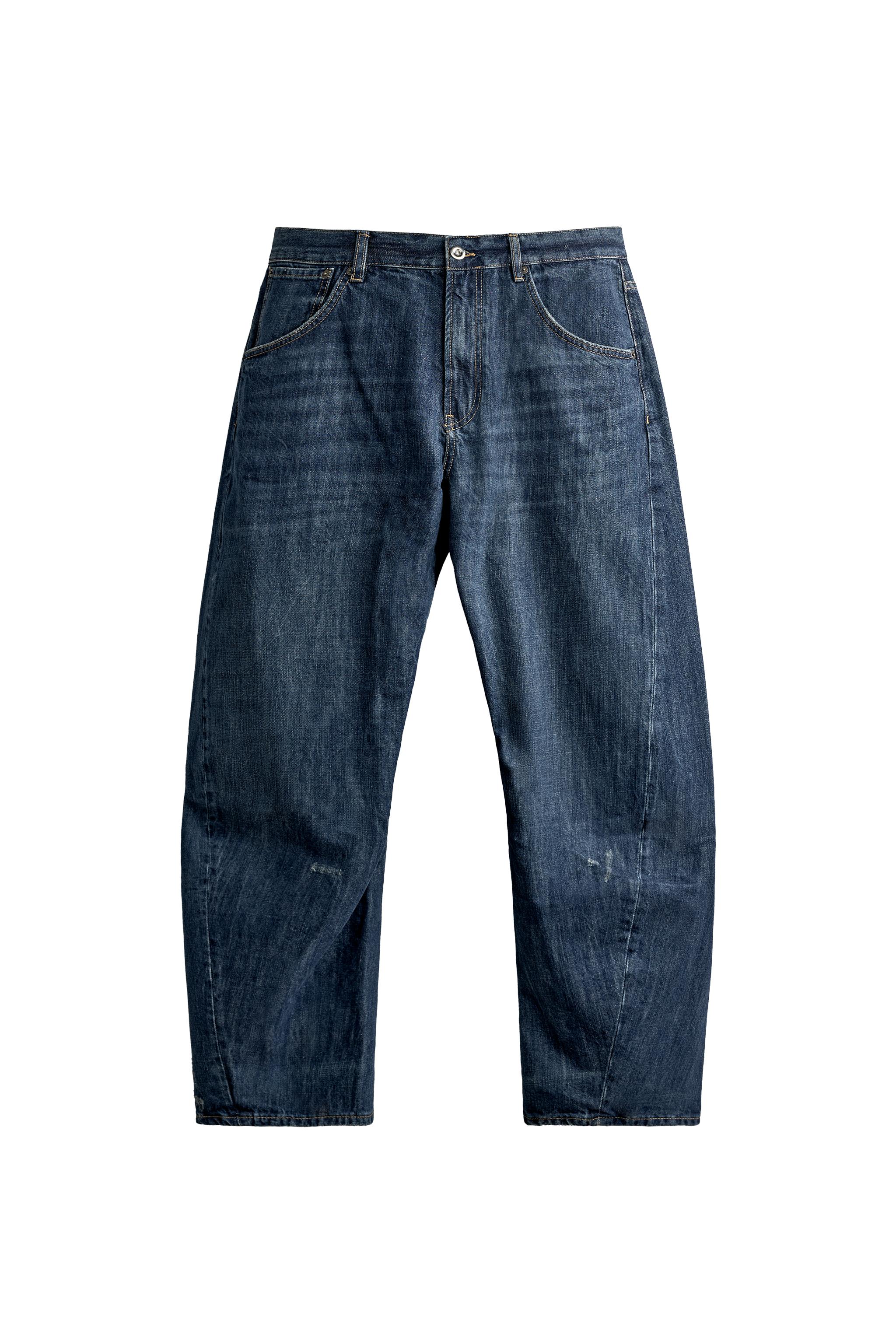 JEANS BARREL FIT COSTURA GIRADA