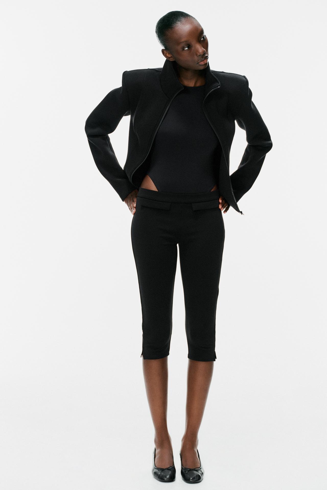 CAPRI TROUSERS WITH FLAPS
