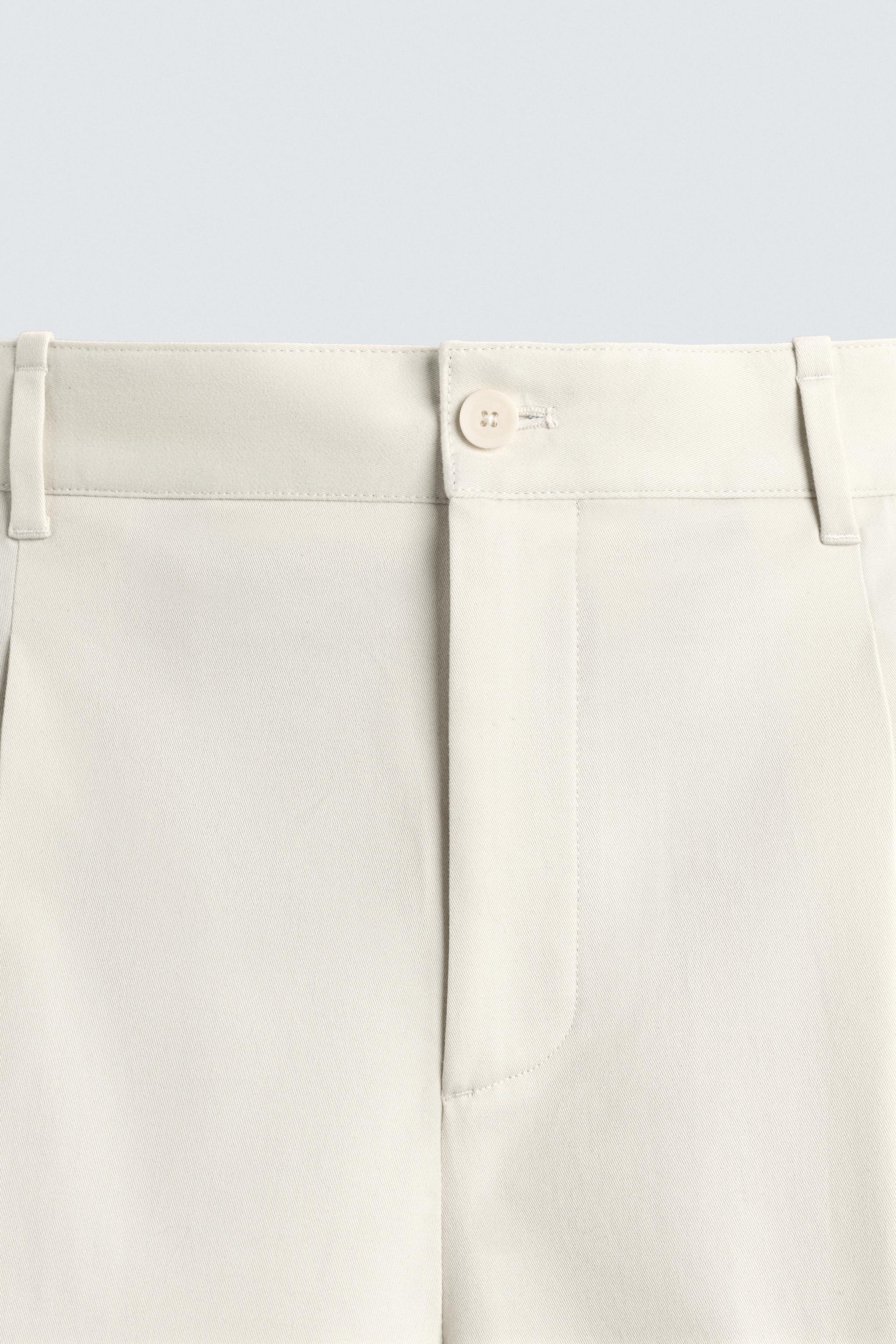 WIDE FIT PLEATED SHORTS