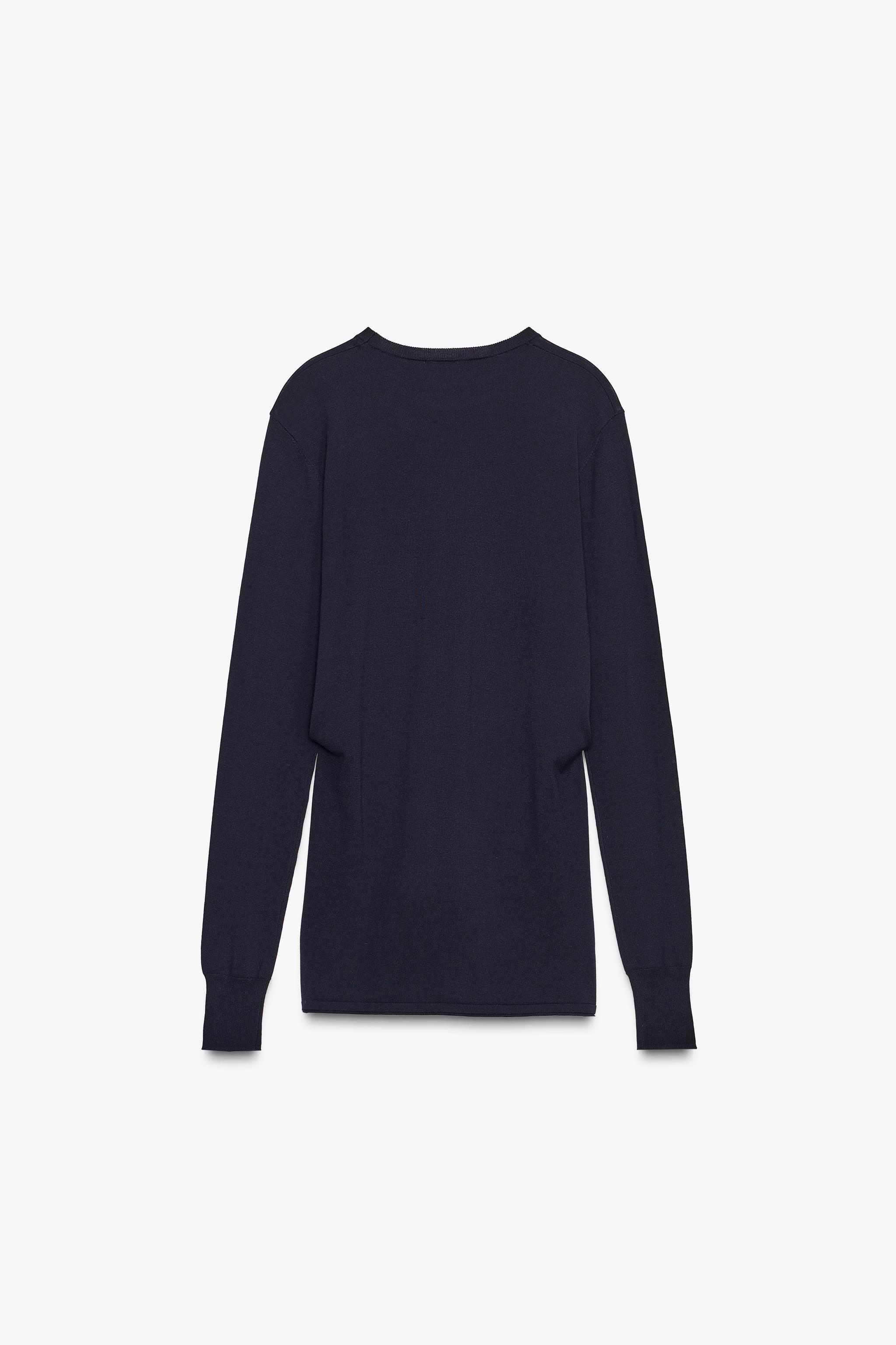 PULL EN MAILLE UNIE NŒUD