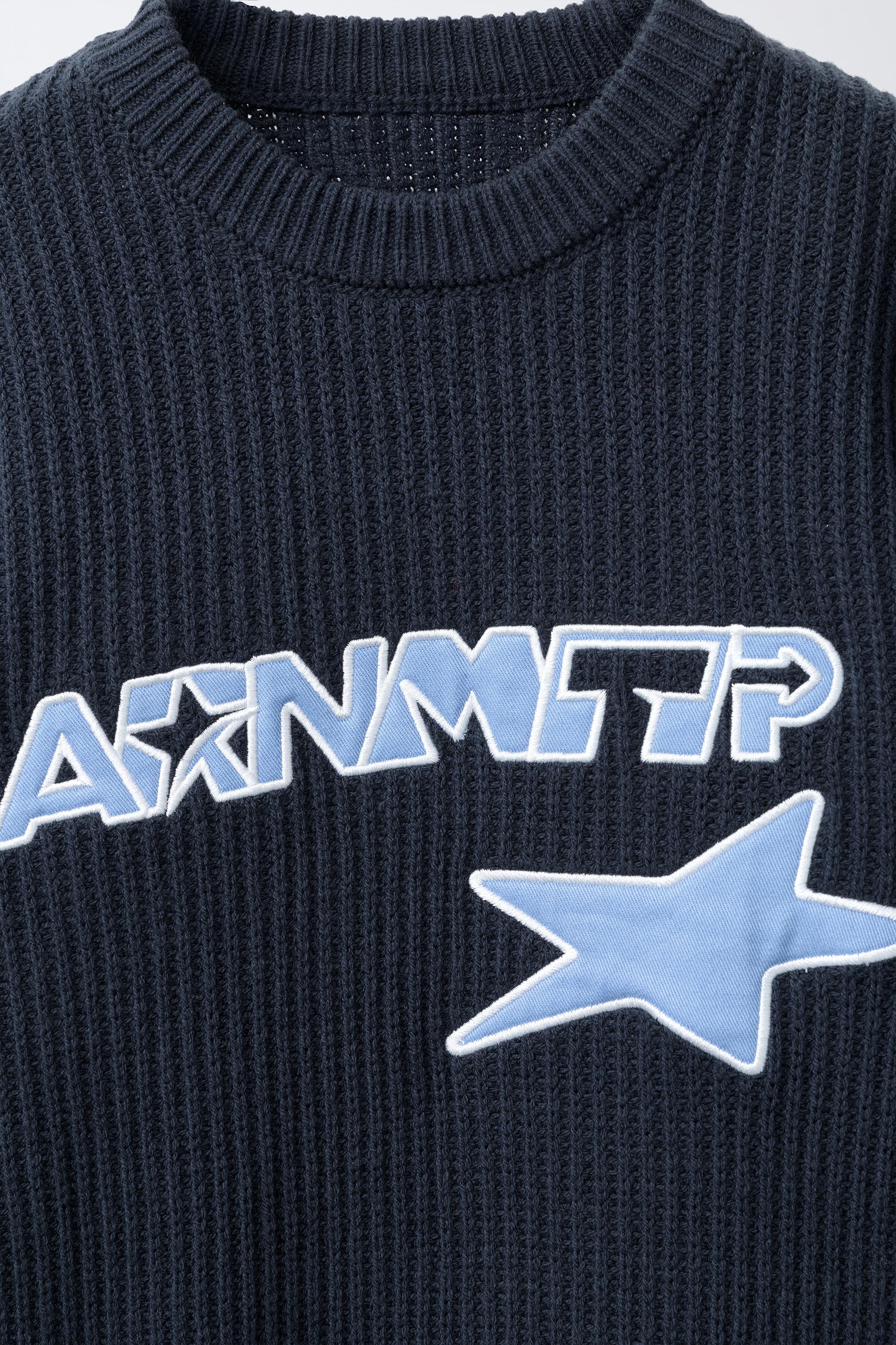 TEXT PATCH KNIT JUMPER