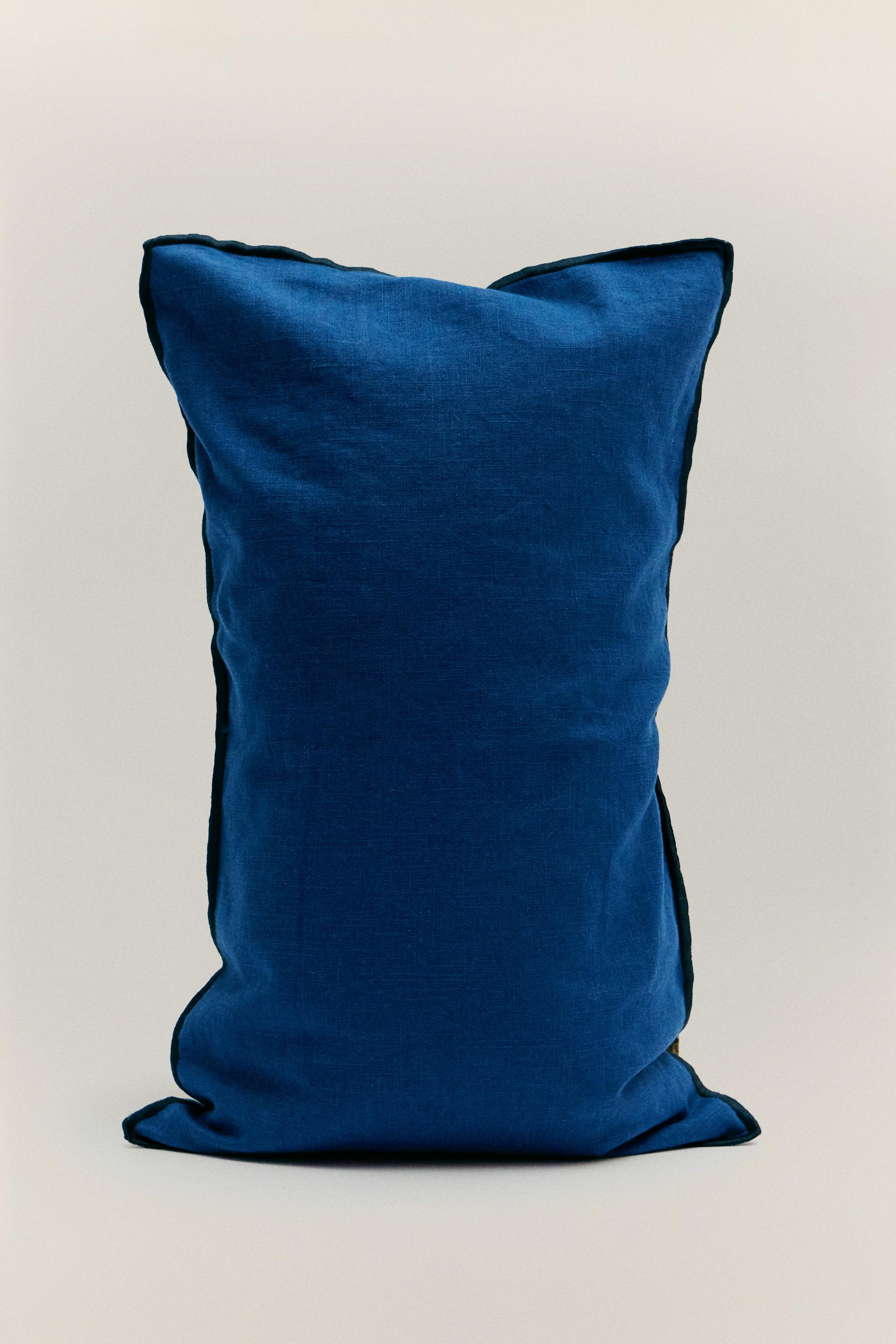 HOUSSE DE COUSSIN OVERLOCK