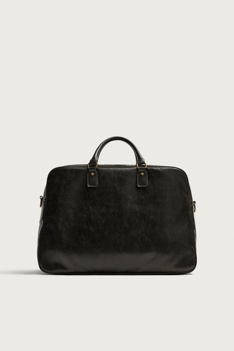 BOLSA DE VIAJE CON EFECTO CUARTEADO 5