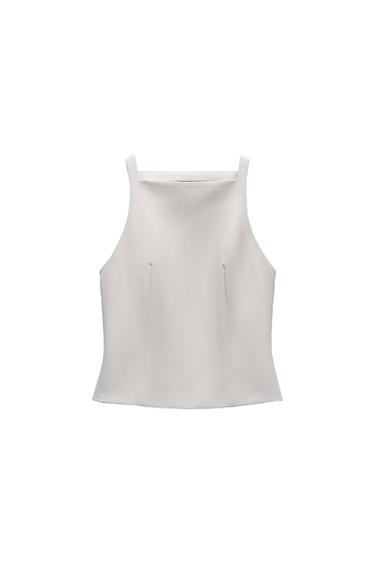White sleeveless top with a square neckline and front darts, on a white background.
