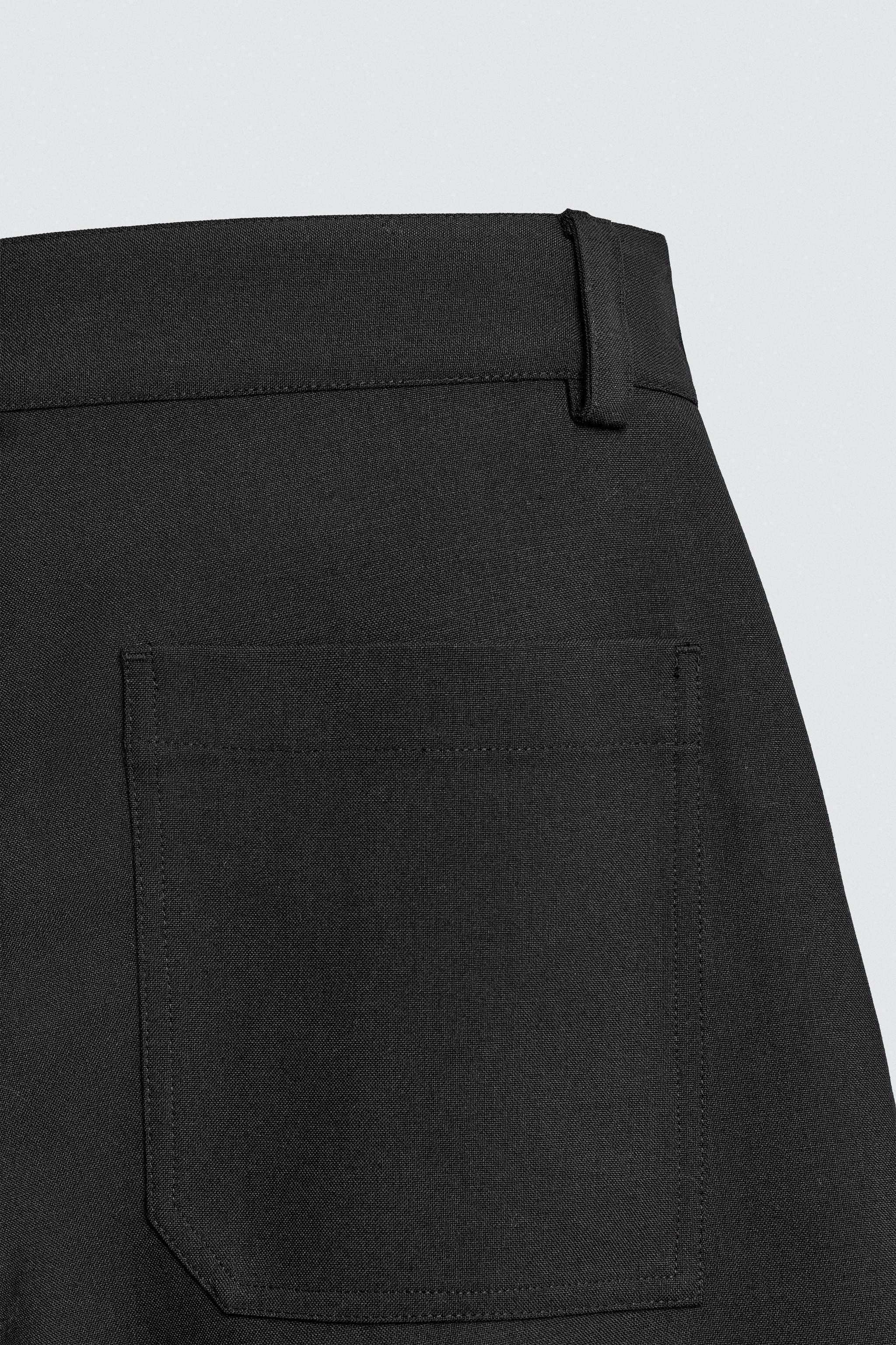 PLEATED BALLOON FIT PANTS