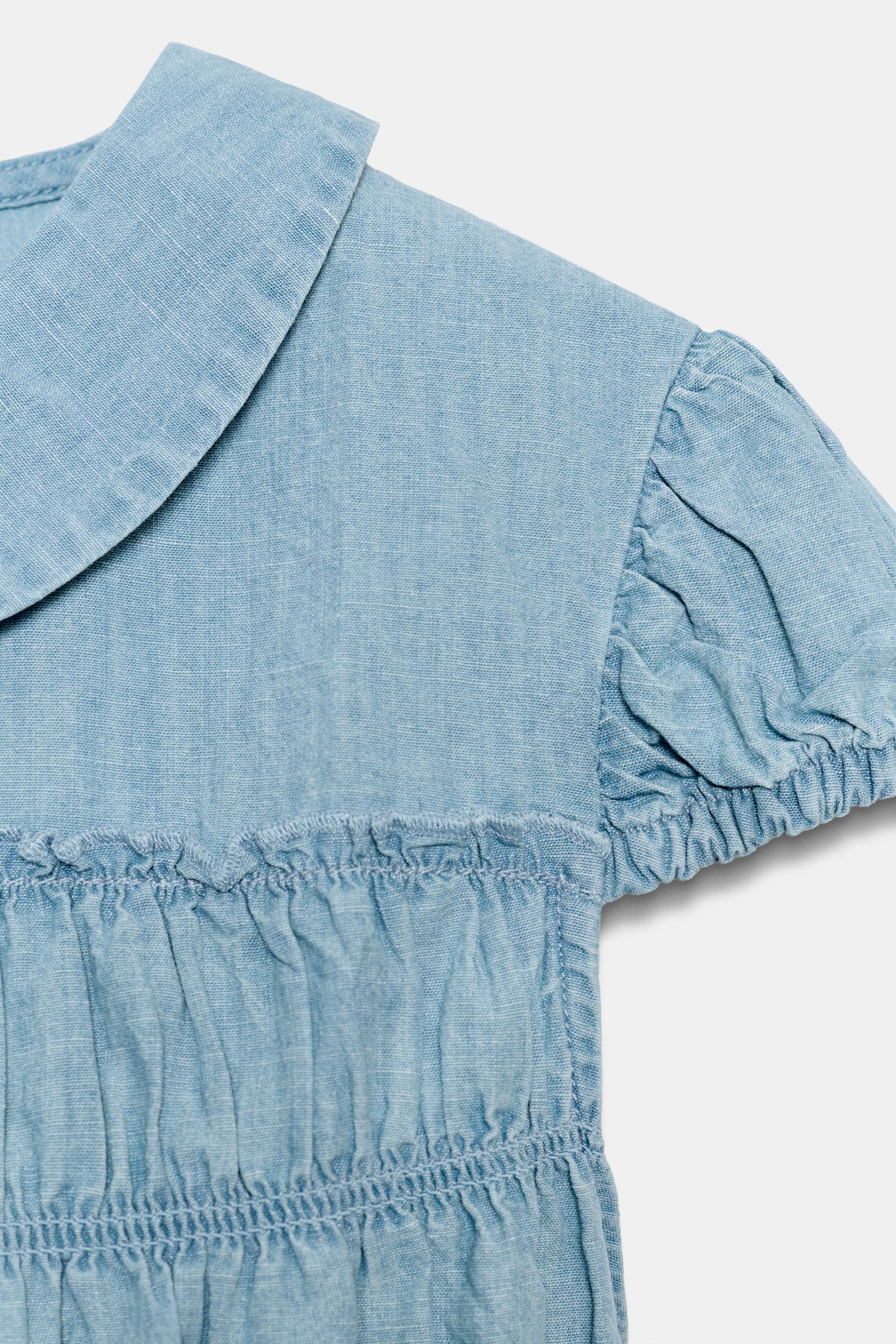 CHEMISE À PLIS ET COL CLAUDINE