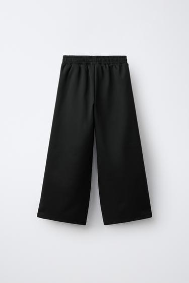 INTERLOCK PLEATED WIDE-LEG PANTS — Black 2