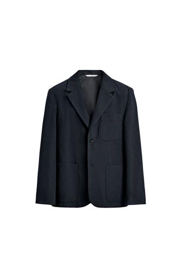 Front view of a navy blazer with a classic lapel and three front pockets.